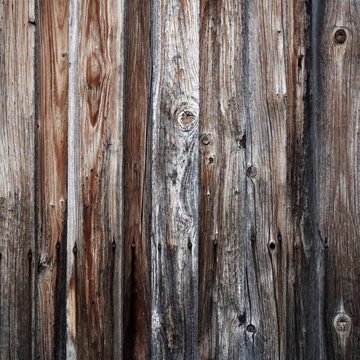 Wallario Möbelfolie Alte Holzwand - Holzplanken in grau und braun