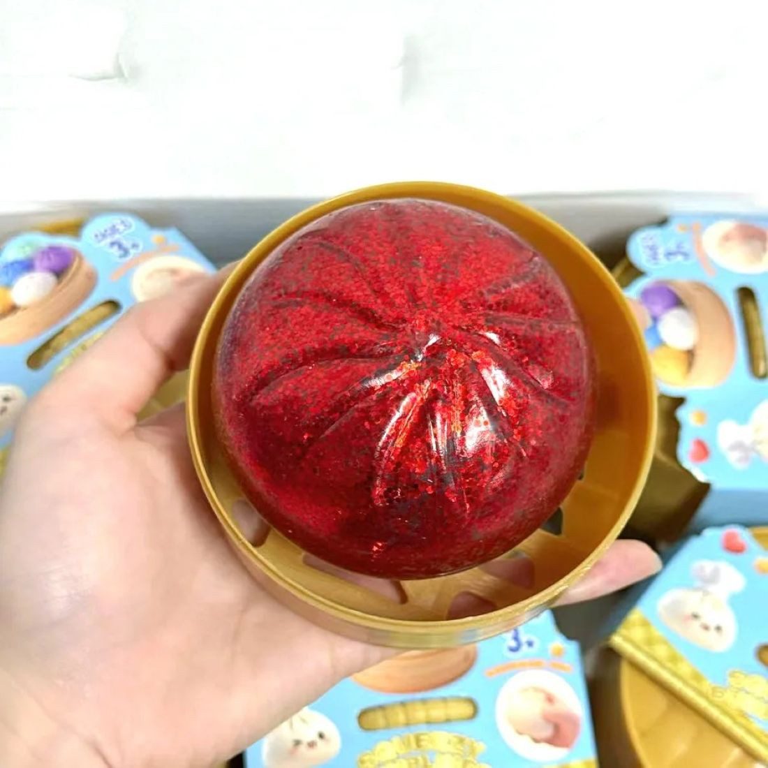 OLi Jumboball Realistisches Glitzer Knödel-Quetschspielzeug mit Bambus-Dampfgarer, Stressabbau-Spielzeug Dumpling-Squishy