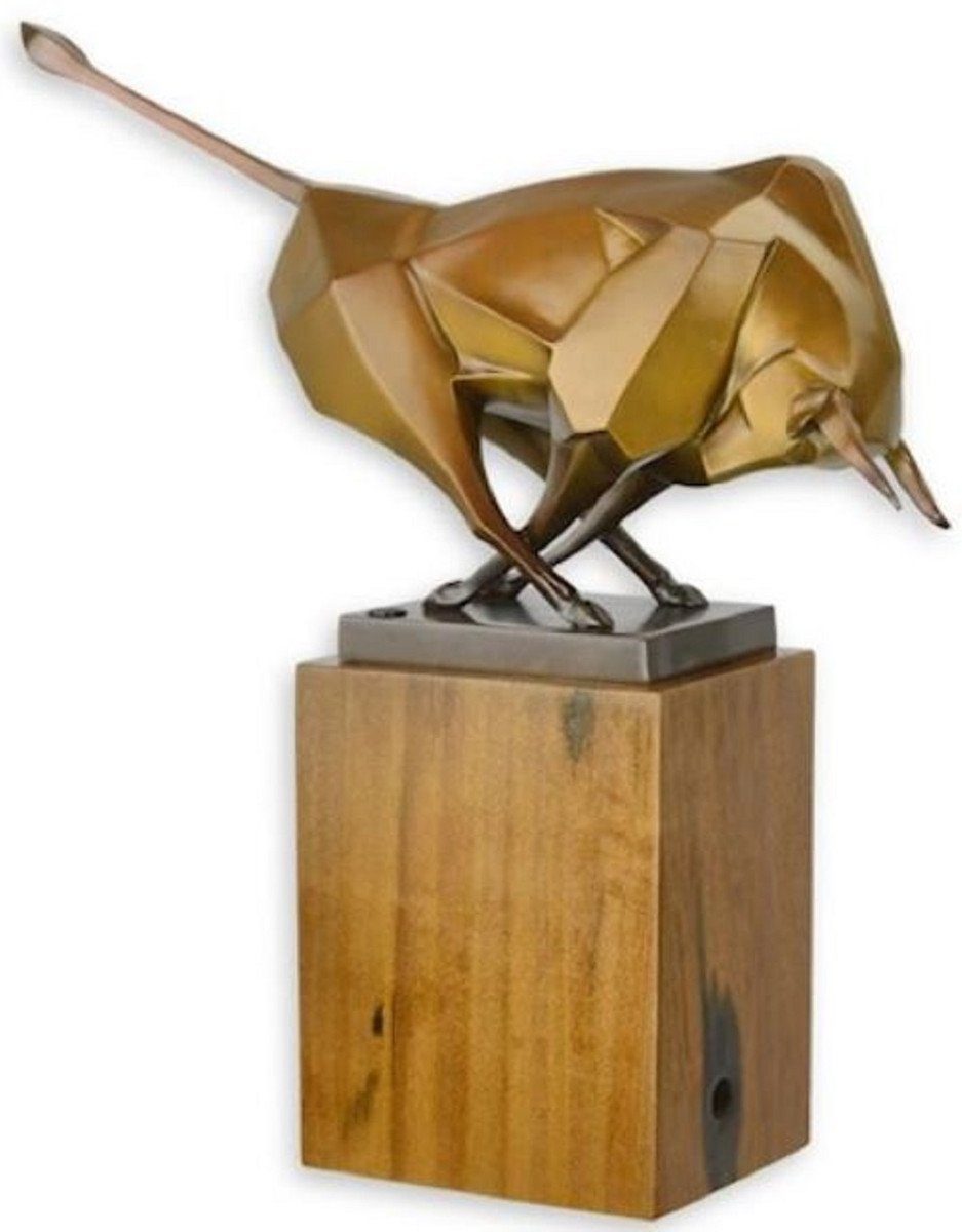 Casa Padrino Dekofigur Designer Bronzefigur Stier Bronze / Gold / Braun 43,5 x 12,9 x H. 44,5 cm - Bronze Skulptur mit Holzsockel - Wohnzimmer Deko - Schreibtisch Deko - Elegante Dekofigur