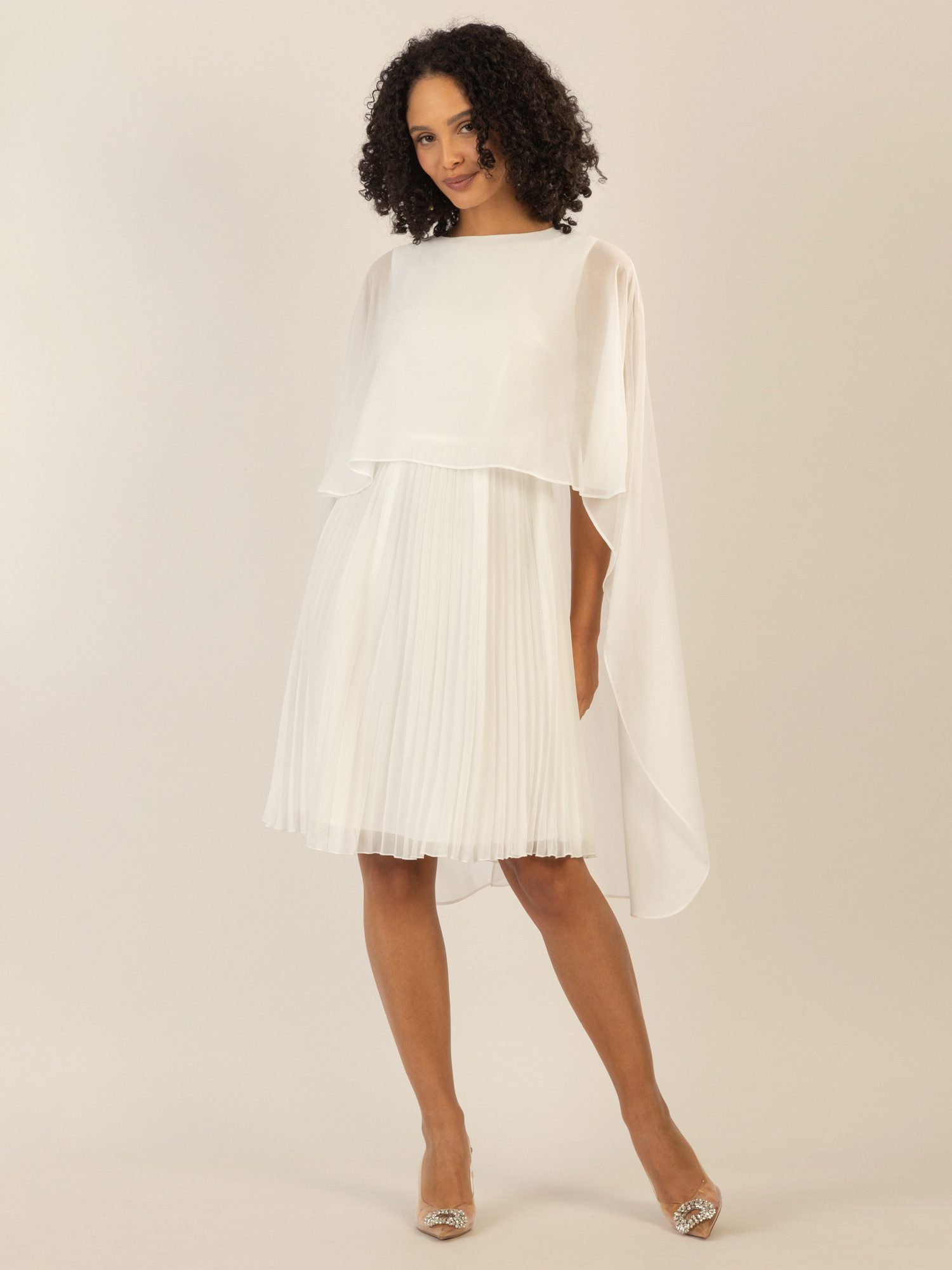 Apart Cocktailkleid mit Plisseerock und angearbeitetem Cape aus Chiffon günstig online kaufen