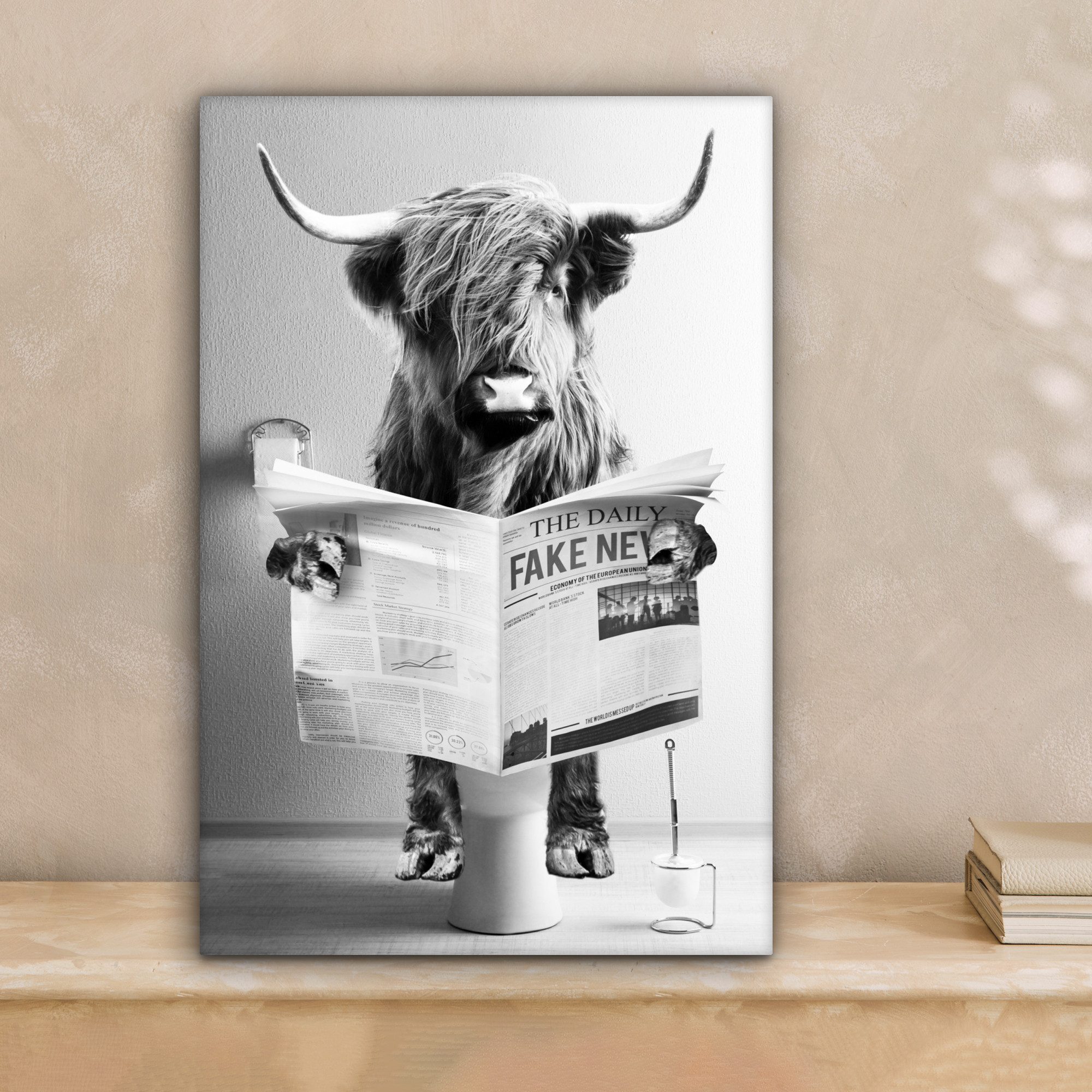 OneMillionCanvasses® Leinwandbild Schottischer Highlander - WC - Zeitung - günstig online kaufen