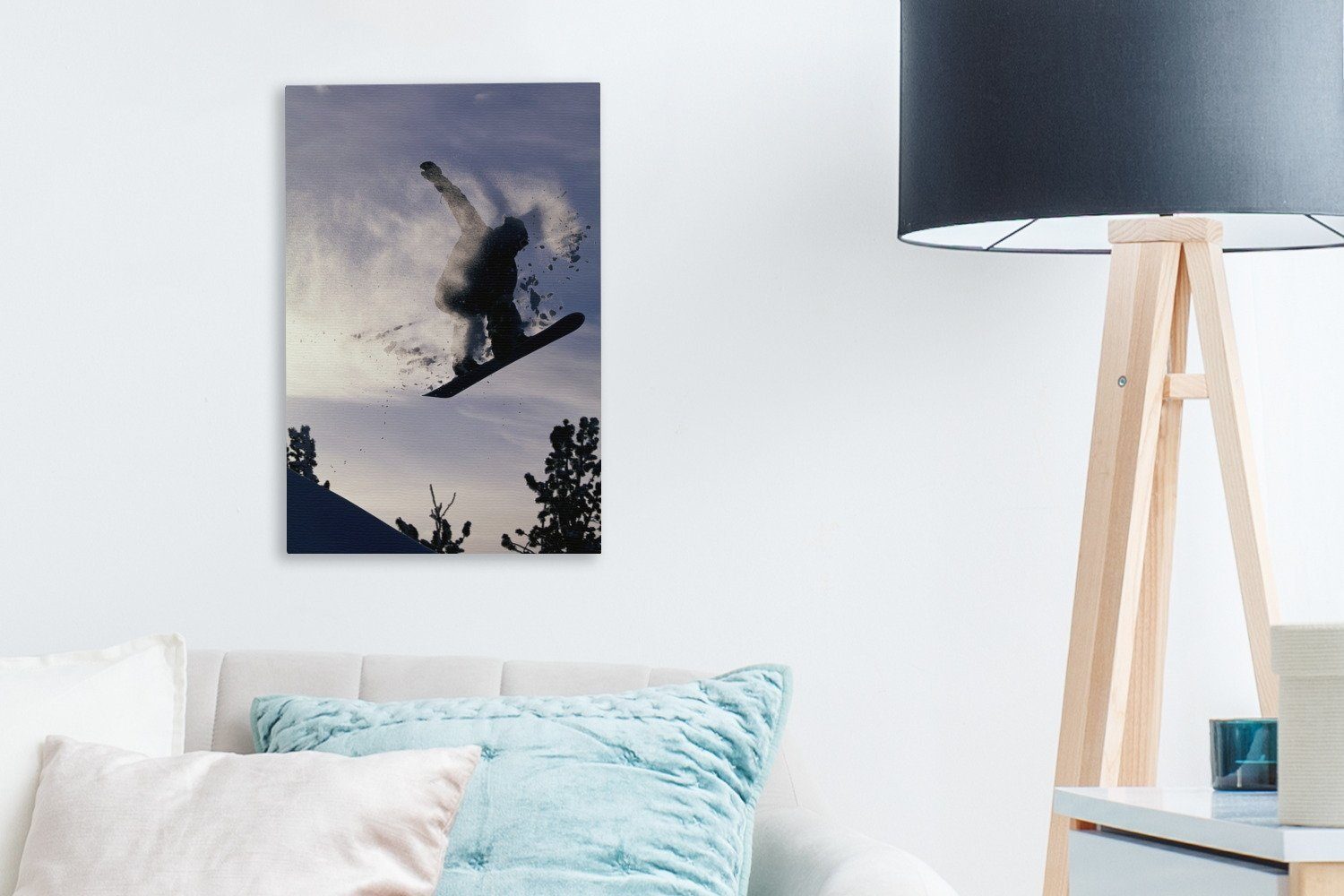 Leinwandbild (1 Gemälde, den hängt bespannt in mit, OneMillionCanvasses® fertig Schnee Zackenaufhänger, Leinwandbild und cm St), nimmt inkl. der Luft Ein Snowboarder 20x30