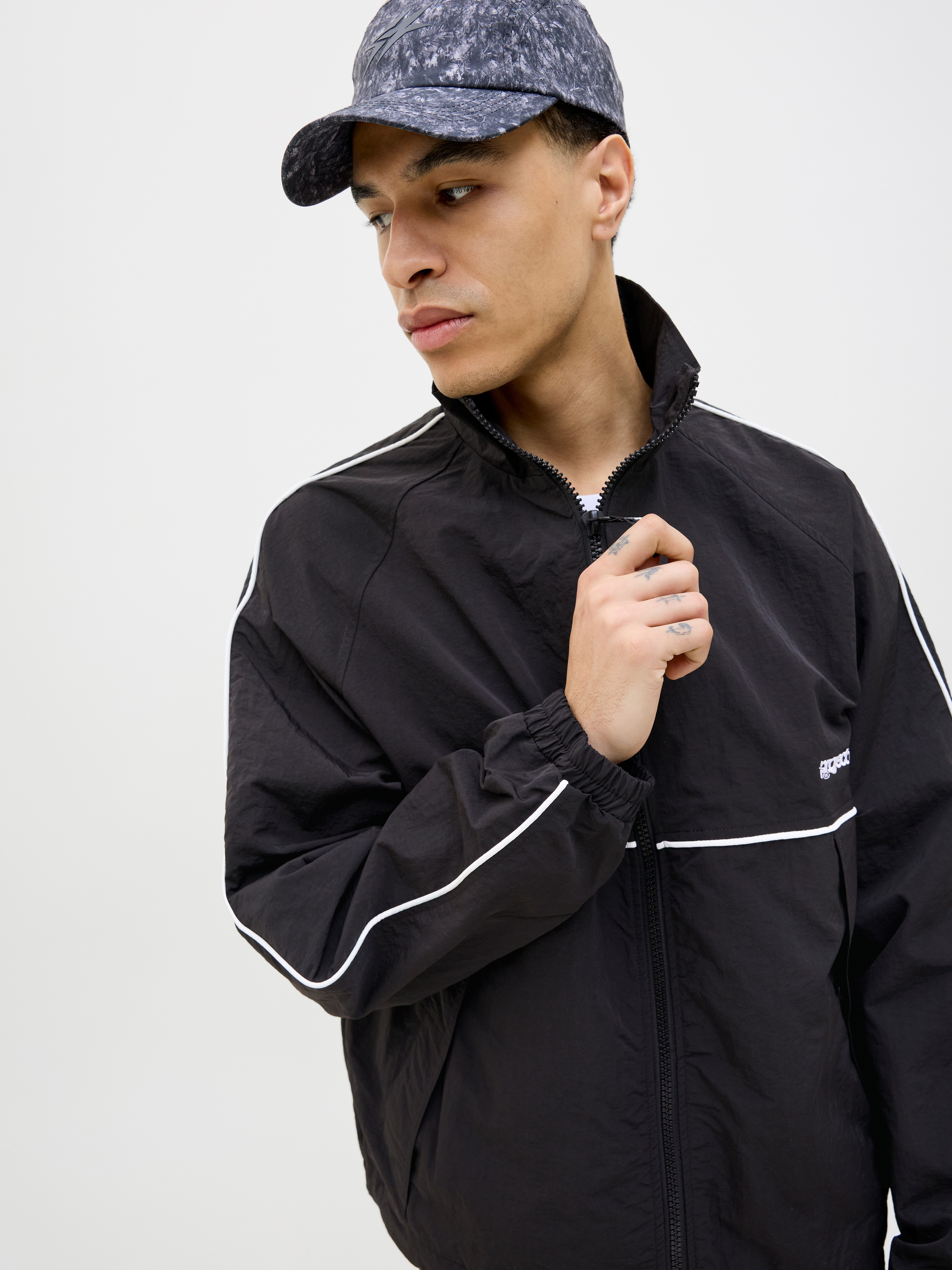 Jack & Jones Outdoorjacke JCOUNION TRACK JACKET SN Mit stylischem Print günstig online kaufen