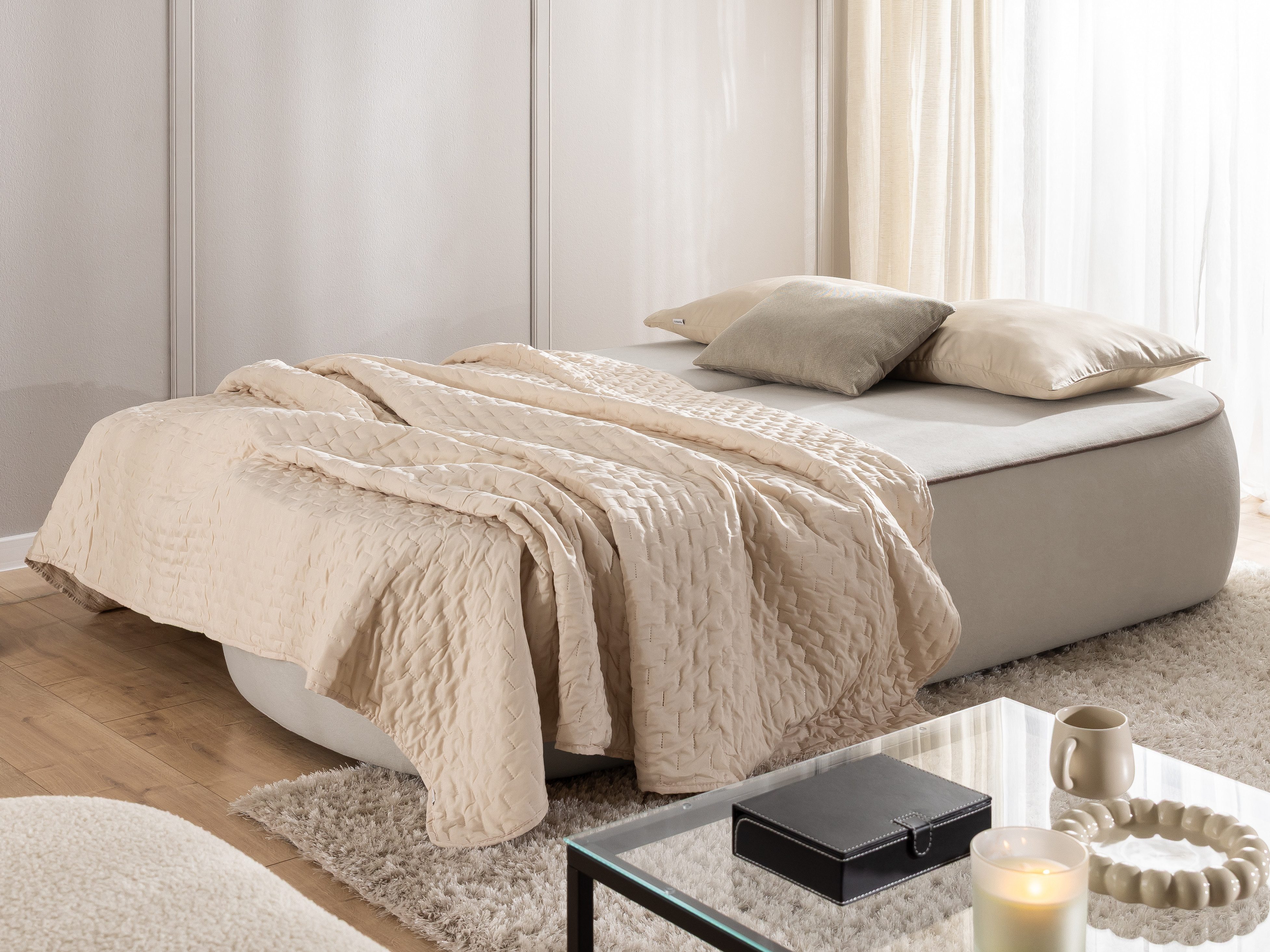 S-Style Möbel Schlafsofa Vero mit Bettkasten und Kontrastpaspel aus Plüschstoff, im modernen und abgerundeten Design