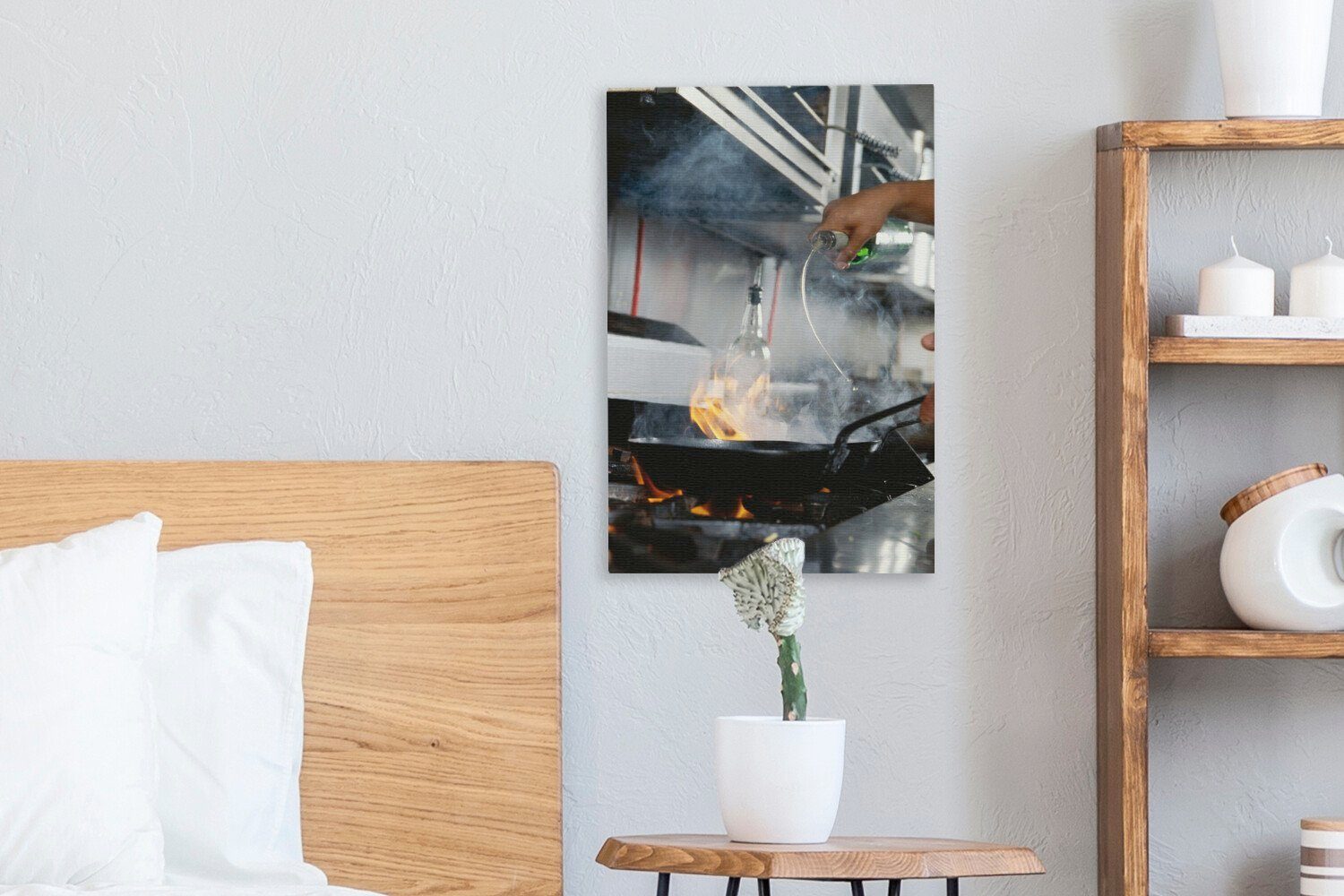 OneMillionCanvasses® Leinwandbild Wok-Öl wird in Leinwandbild gegossen, eine inkl. fertig bespannt Wok-Pfanne (1 20x30 Gemälde, cm St), Zackenaufhänger