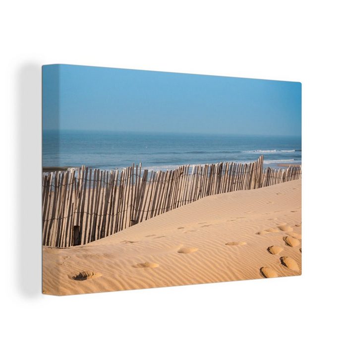 OneMillionCanvasses® Leinwandbild Strand - Pfähle - Meer (1 St) Wandbild Leinwandbilder Aufhängefertig Wanddeko