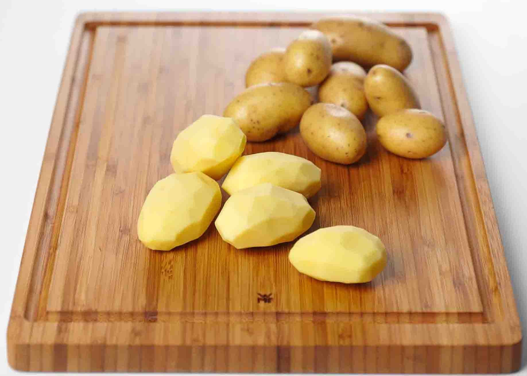 WMF Schneidebrett, Bambus, (1-St), aus Bambus mit Saftrille, beidseitig nutzbar