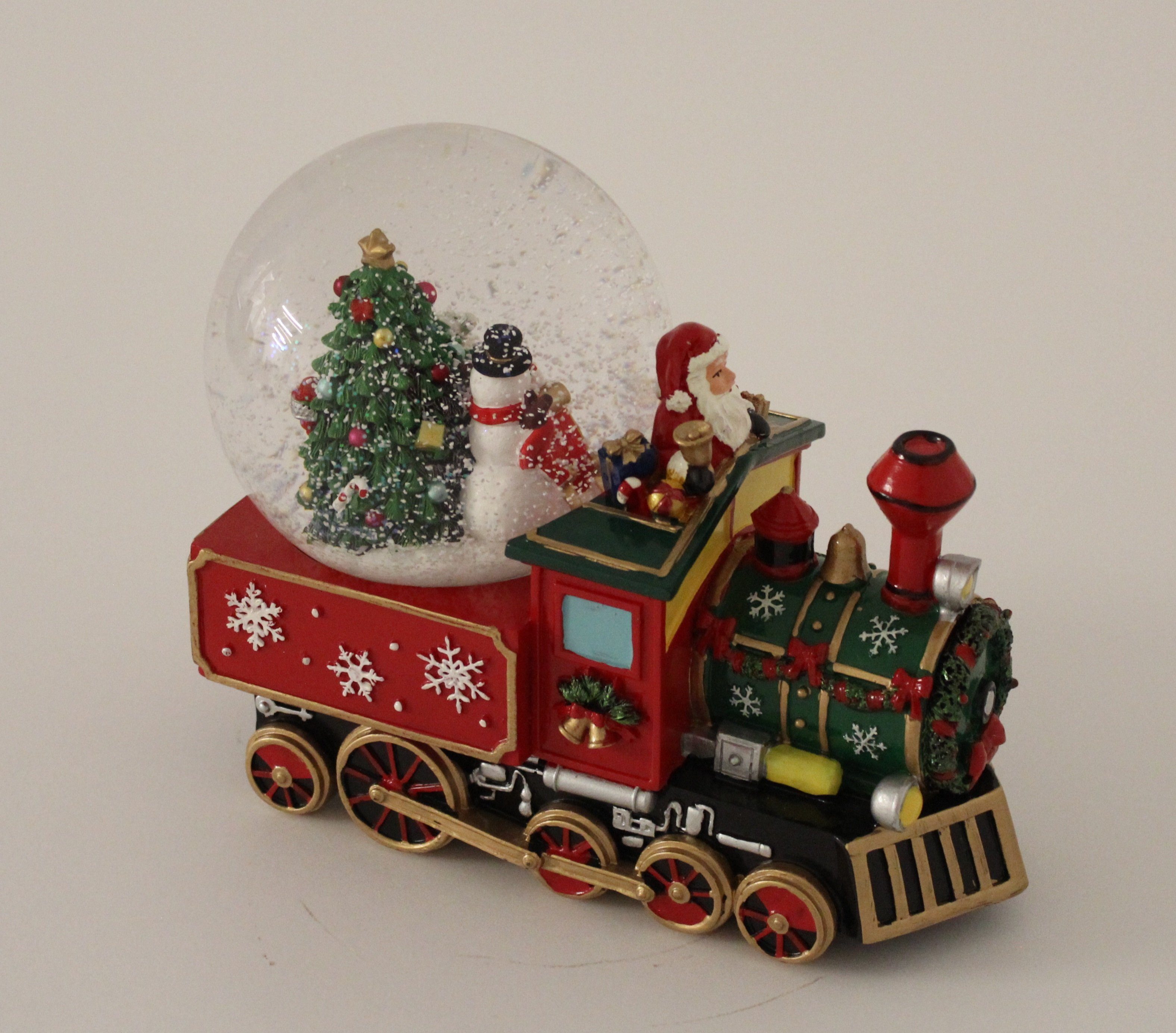 Wurm Schneekugel Spieluhr Lokomotive Nikolaus, Schneemann und Schlitten