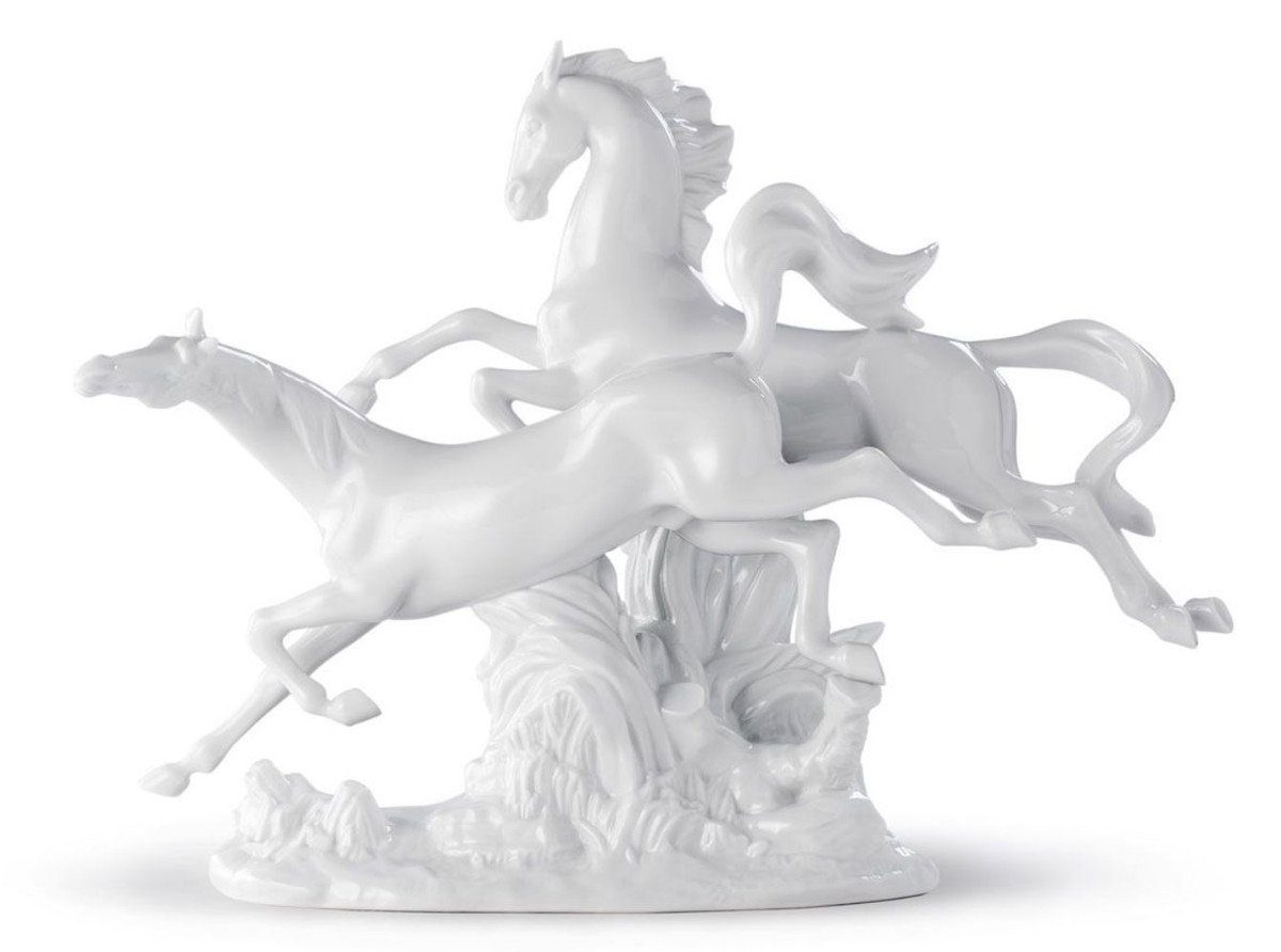 Casa Padrino Dekofigur Casa Padrino Luxus Porzellan Skulptur Springende Pferde Weiß 38 x H. 30 cm - Luxus Kollektion