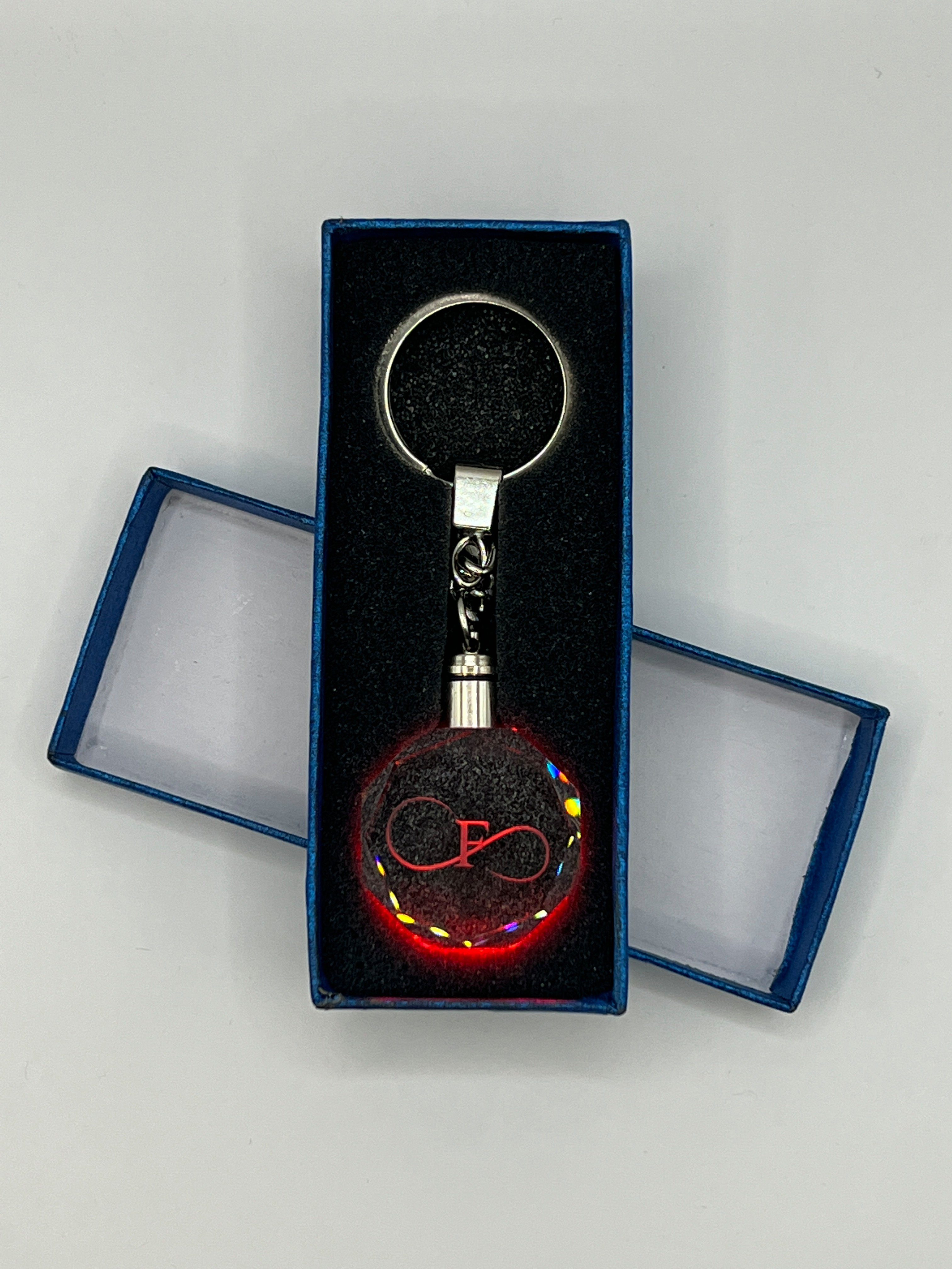 Stelby Schlüsselanhänger Unendlichkeitszeichen Schlüsselanhänger F Multicolor mit Geschenkbox