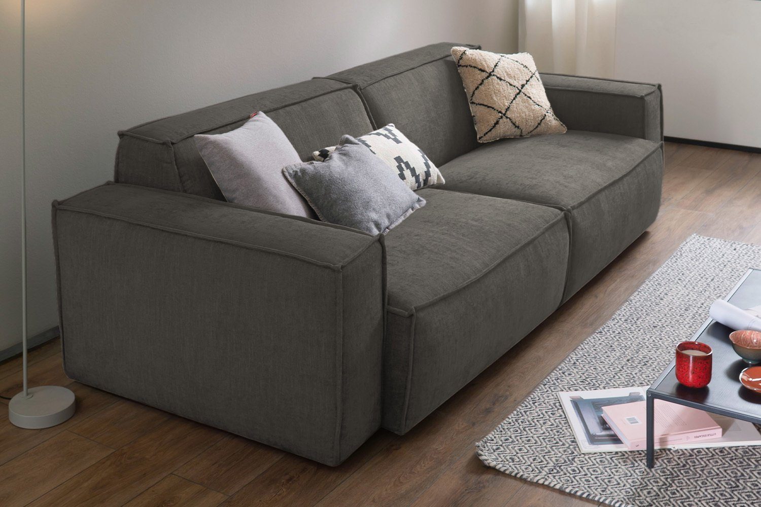 KAWOLA Sofa SAMU, Stoff 2-Sitzer od. 3-Sitzer versch. Farben grau