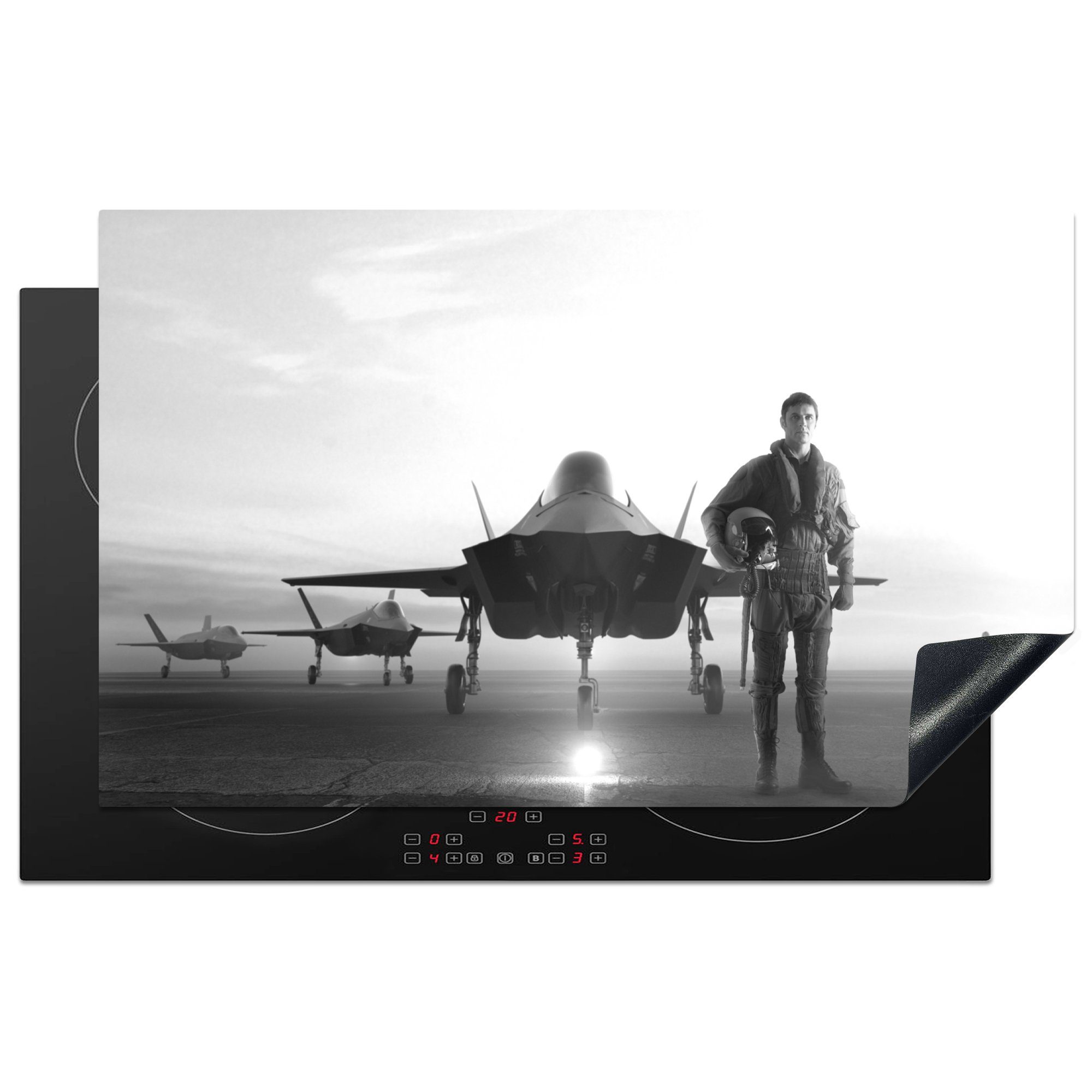 MuchoWow Herdblende-/Abdeckplatte Pilot steht neben seinem Jet - schwarz und weiß, Vinyl, (1 tlg), 83x51 cm, Ceranfeldabdeckung, Arbeitsplatte für küche