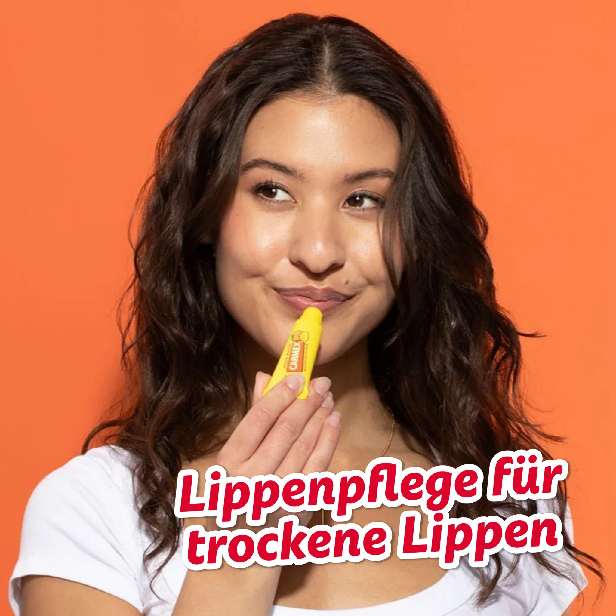Carmex Lippenpflegestift Carmex Peach Mango Tube - Lippenpflege für trockene Lippen - 10g