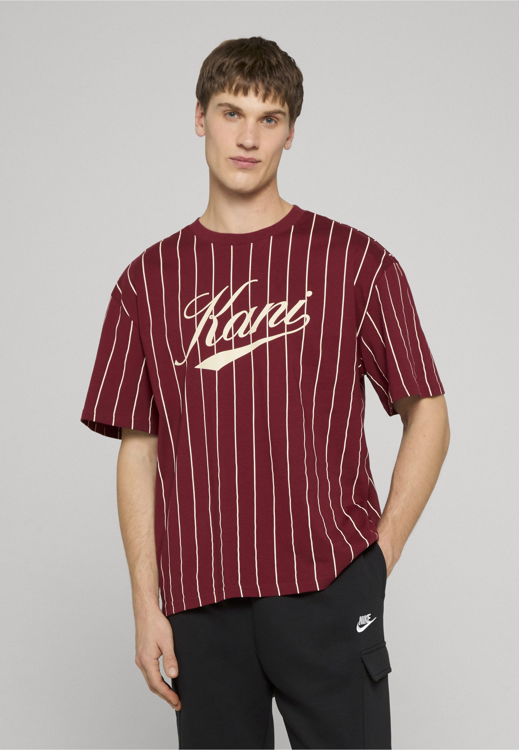 Karl Kani T-Shirt Karl Kani Cursive Varsity Pinstripe T-Shirt (1-tlg)