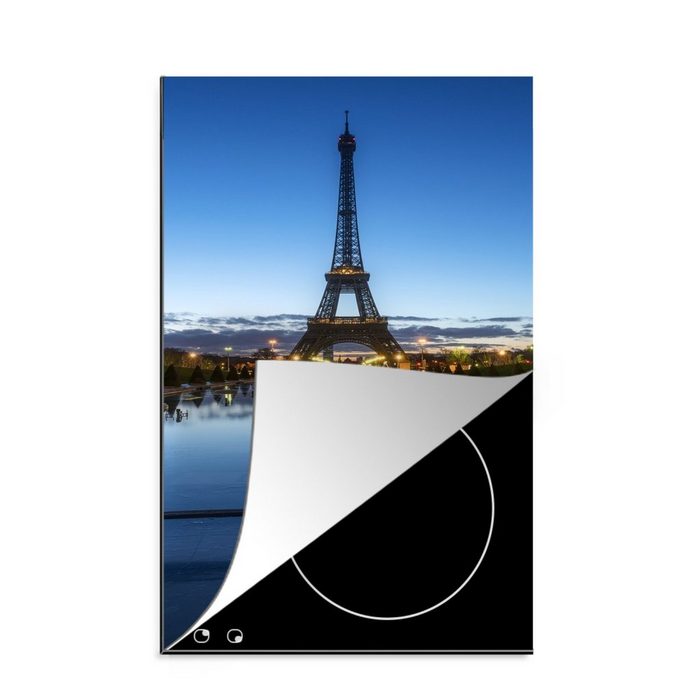 MuchoWow Herdblende-/Abdeckplatte Der Eiffelturm am Abend bei sehr klarem Himmel in Paris Vinyl (1 tlg) Küchen Dekoration für Induktionsherd Induktionskochfeld