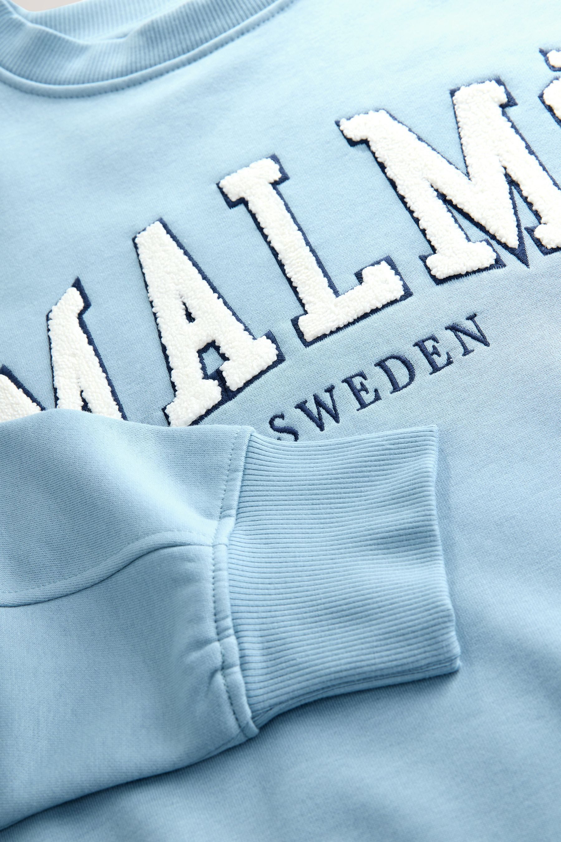 Next Sweater Relaxed Fit Boucle-Sweatshirt mit Grafikprint (1-tlg) günstig online kaufen