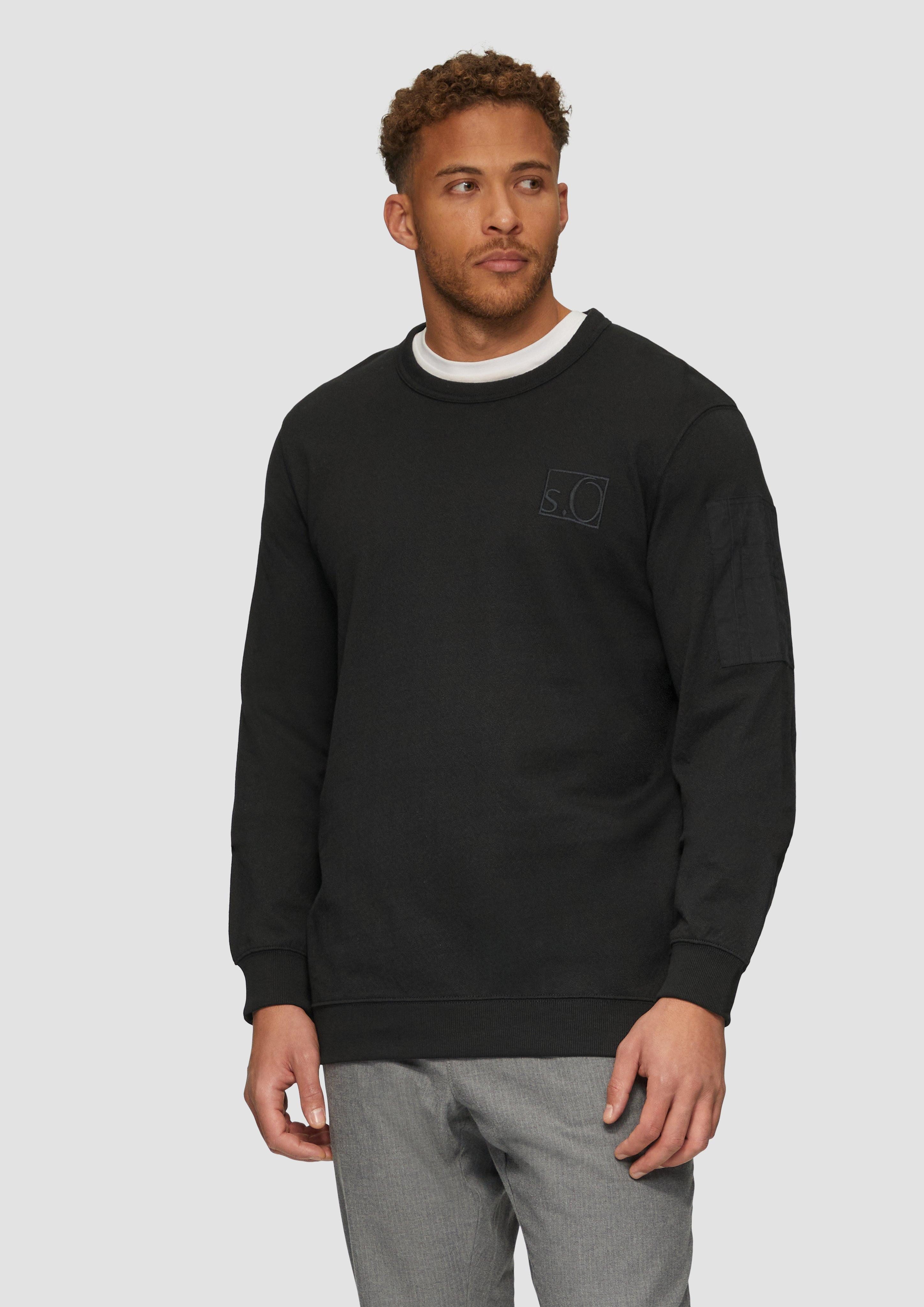 Sweatshirt Relaxed-Fit-Sweatshirt mit Ärmeltasche