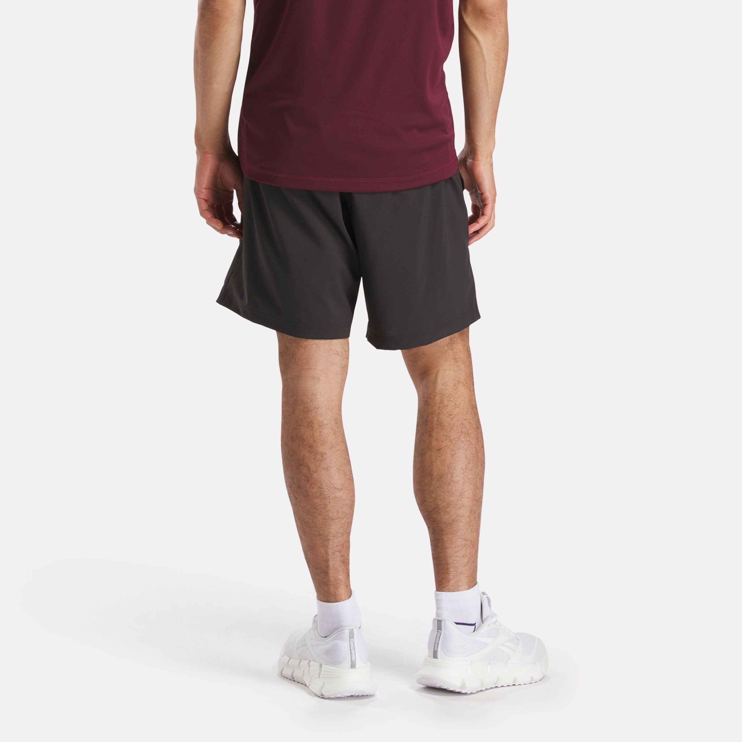 Reebok Trainingsshorts WOR WOVEN SHORT kurze Trainingsshorts, ca. Mitte Oberschenkel geschnitten