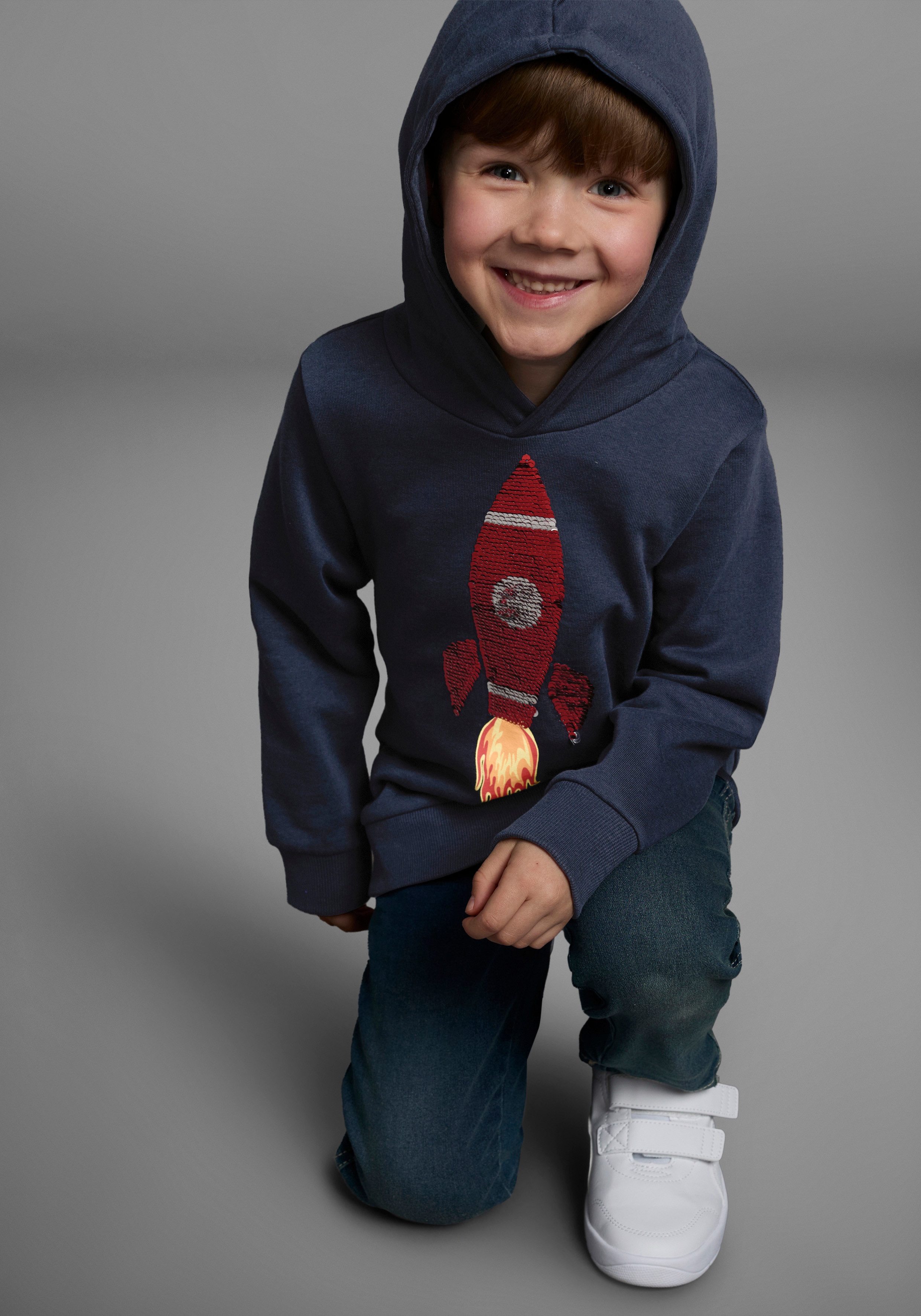 KIDSWORLD Kapuzensweatshirt Rakete - Wendepaillette lange Ärmel, Basic-Passform, aus Baumwolle, mit Rippbündchen