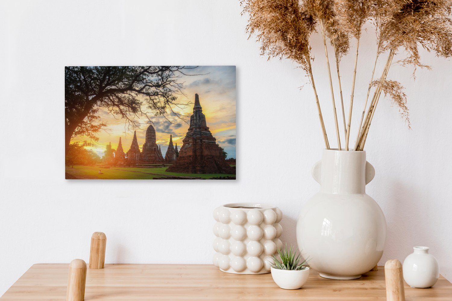 den scheint Leinwandbilder, Leinwandbild cm Wanddeko, OneMillionCanvasses® in 30x20 Tempeln Wandbild St), (1 Ayutthaya, Aufhängefertig, Sonne zwischen Die
