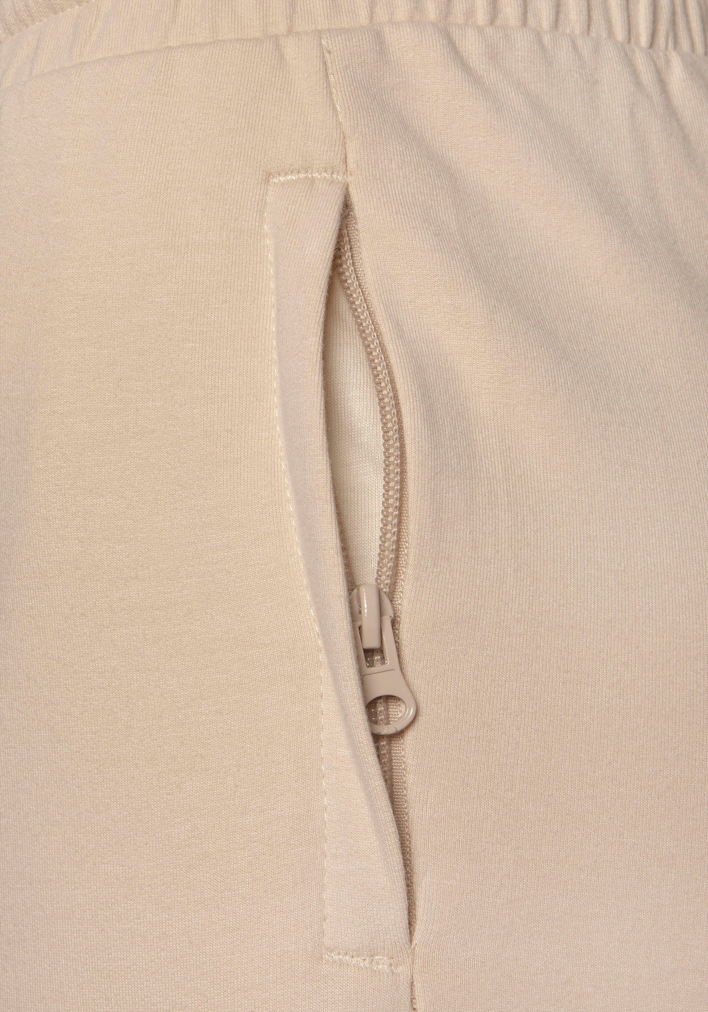 Loungewear Homewearhose beige Taschen, Reißverschluss Loungeanzug mit Bench.