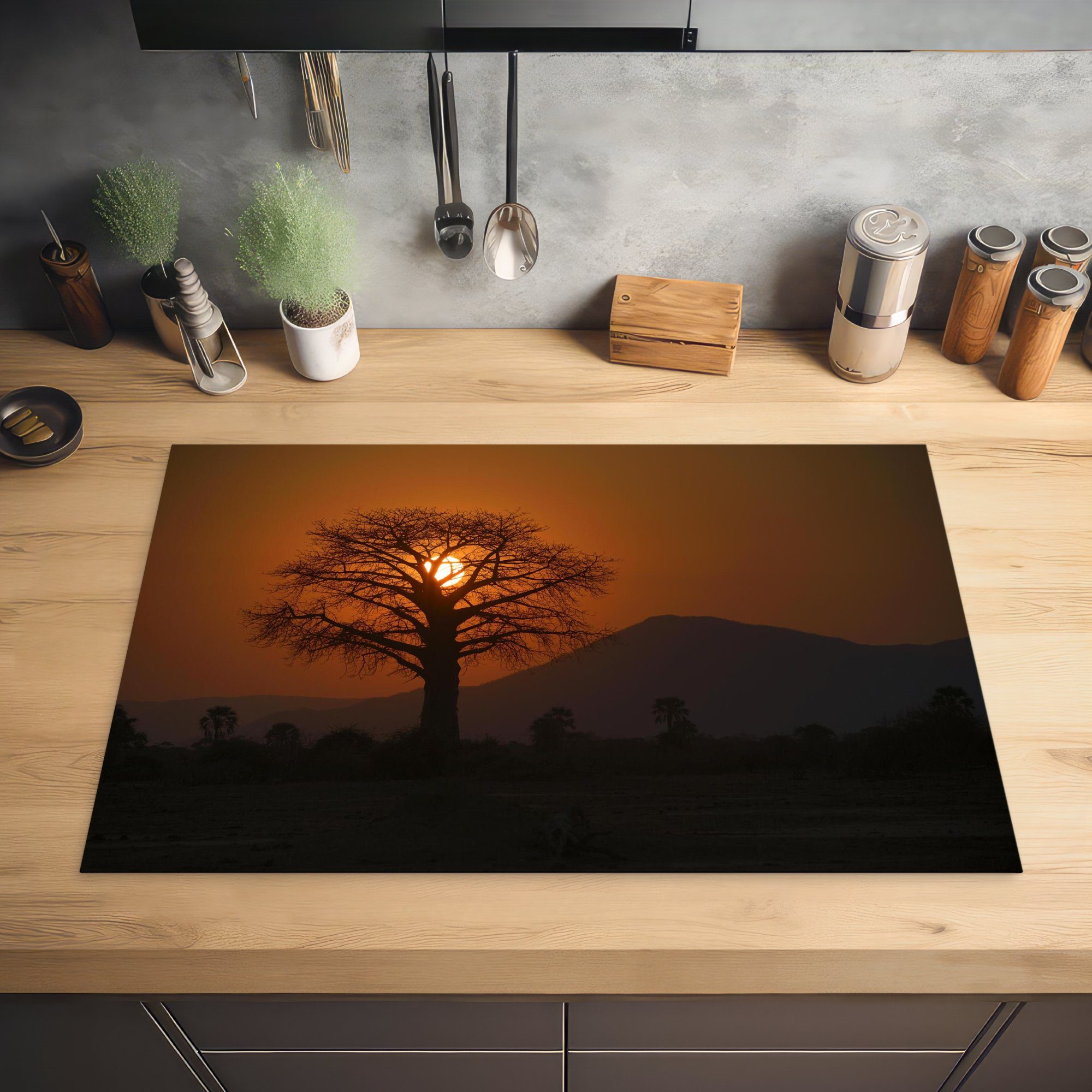 Sonnenuntergang Herdblende-/Abdeckplatte Lower Schutz im küche, Vinyl, tlg), für cm, die Induktionskochfeld Oranger hinter Zambezi, (1 einem MuchoWow Baobab-Baum 81x52 Ceranfeldabdeckung