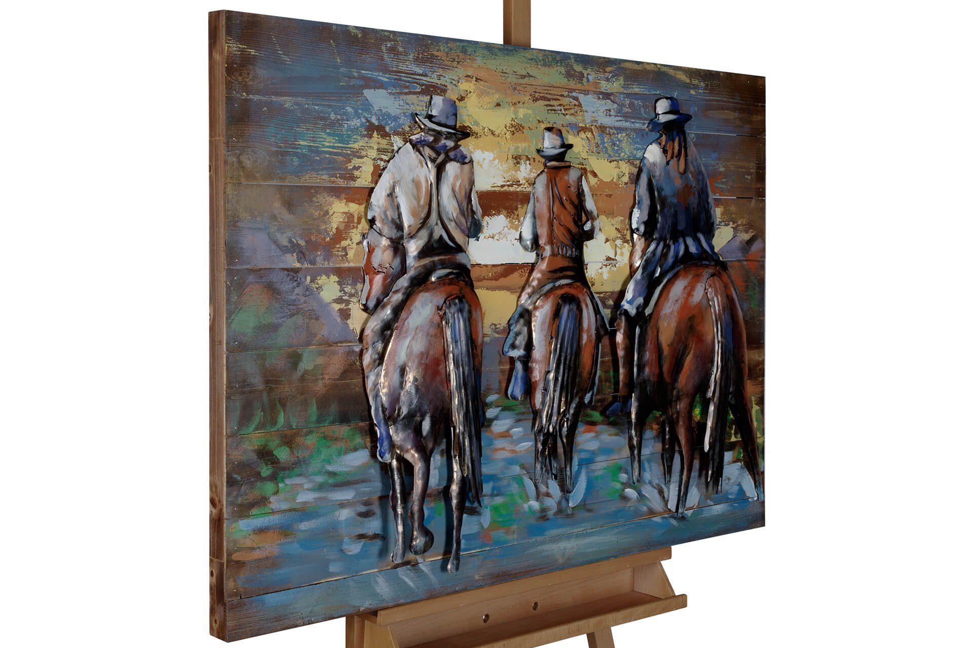 KUNSTLOFT Holzbild Cowboys Ride at Sunset 100x75 cm, handgefertiges Wandbild aus Holz