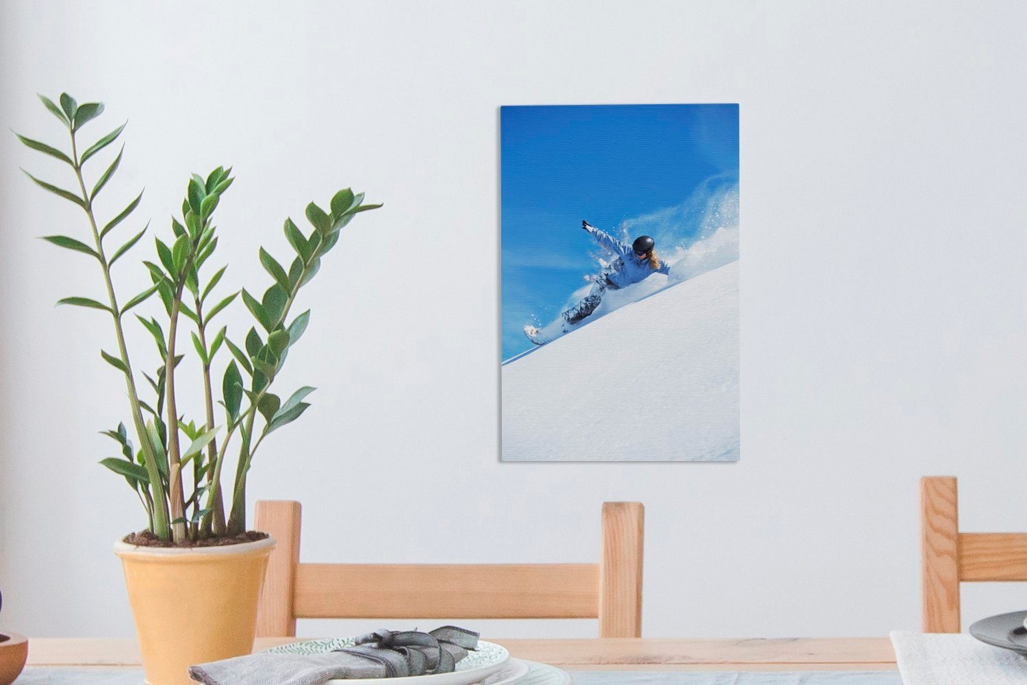 OneMillionCanvasses® Leinwandbild Ein Snowboarder stürzt St), Zackenaufhänger, 20x30 von die fertig Leinwandbild Berg Tiefe, cm einem Gemälde, bespannt (1 in inkl