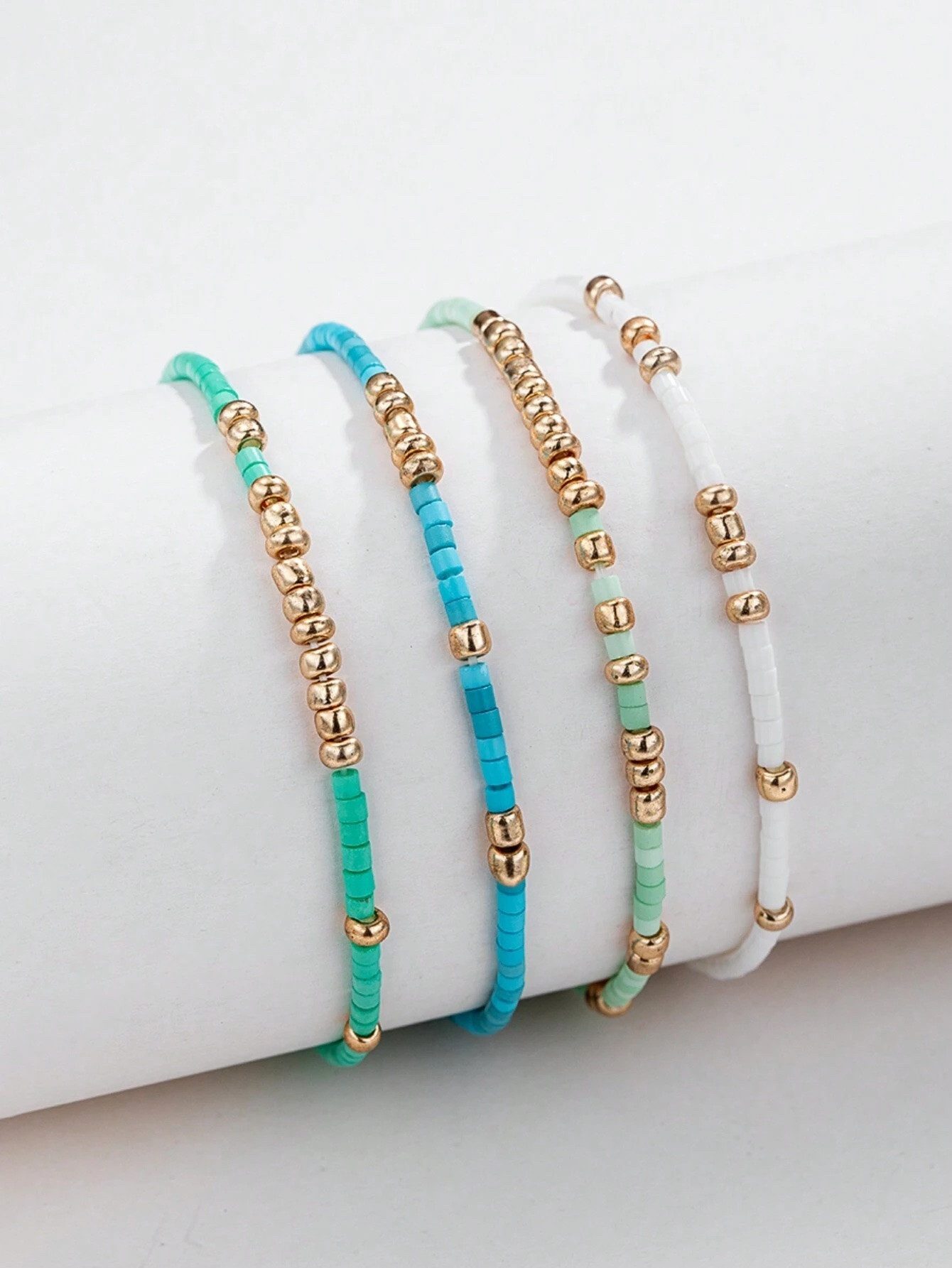 The Beauty House Armband 4 Stück Handgefertigte Stretch-Armbänder mit türkisfarbenen Perlen, – boho-inspirierter Schmuck für den Strand