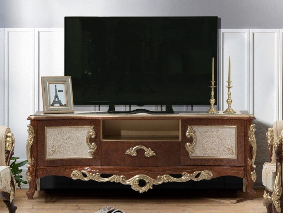 Casa Padrino TV-Schrank Luxus Barock TV Schrank Braun / Gold - Handgefertigtes Massivholz Sideboard mit 2 Türen und Schublade - Barock Wohnzimmer Möbel