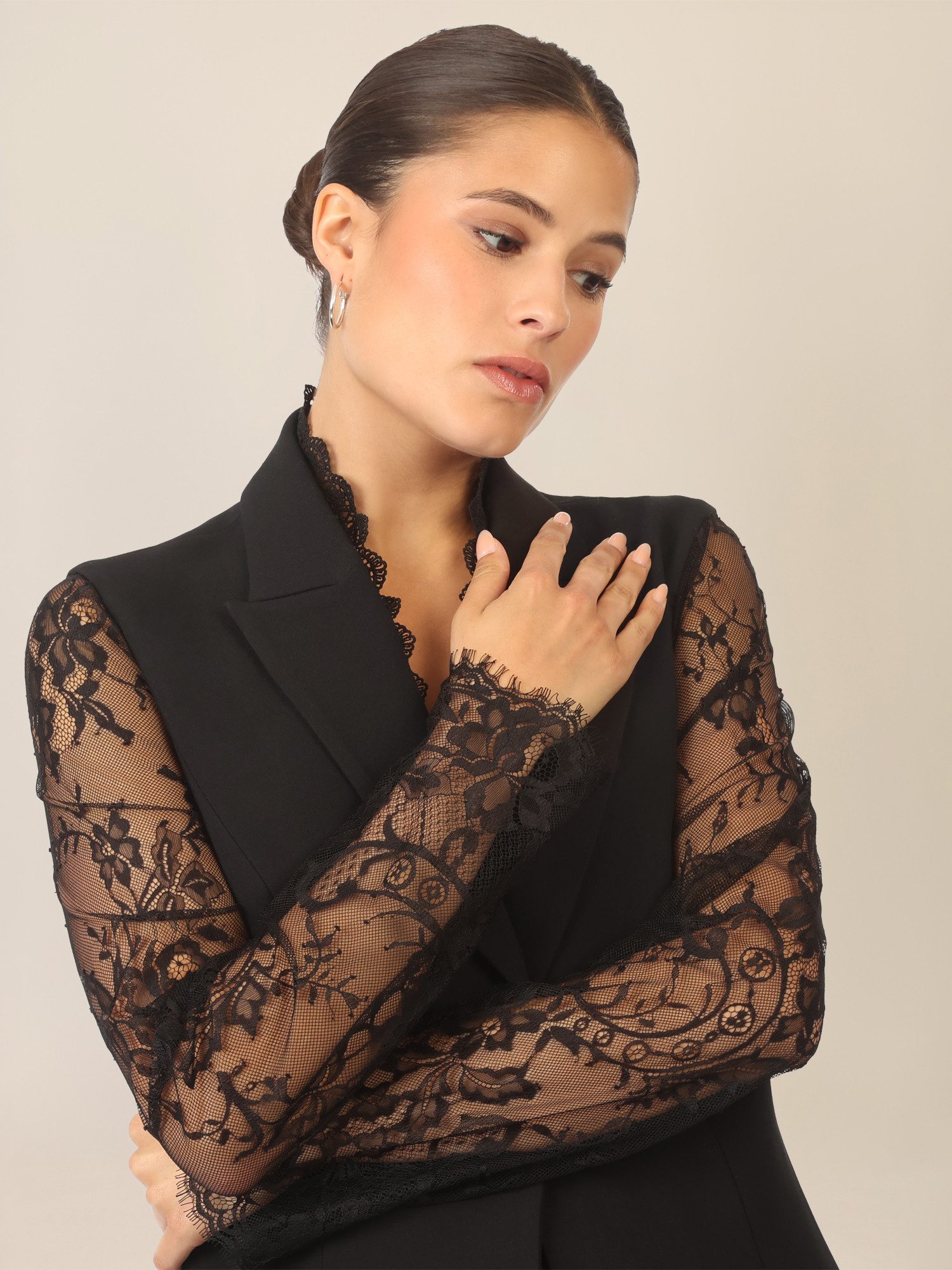 Apart pantsuit with lace details and decorative edge
