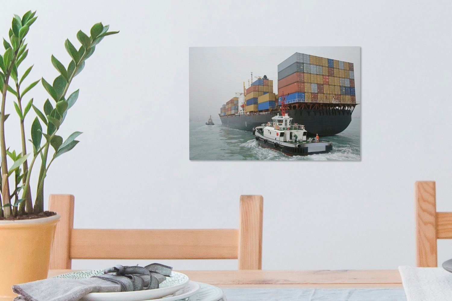 OneMillionCanvasses® Leinwandbild Schlepper Wanddeko, cm St), 30x20 Leinwandbilder, her, Containerschiff (1 neben fährt einem Wandbild Aufhängefertig