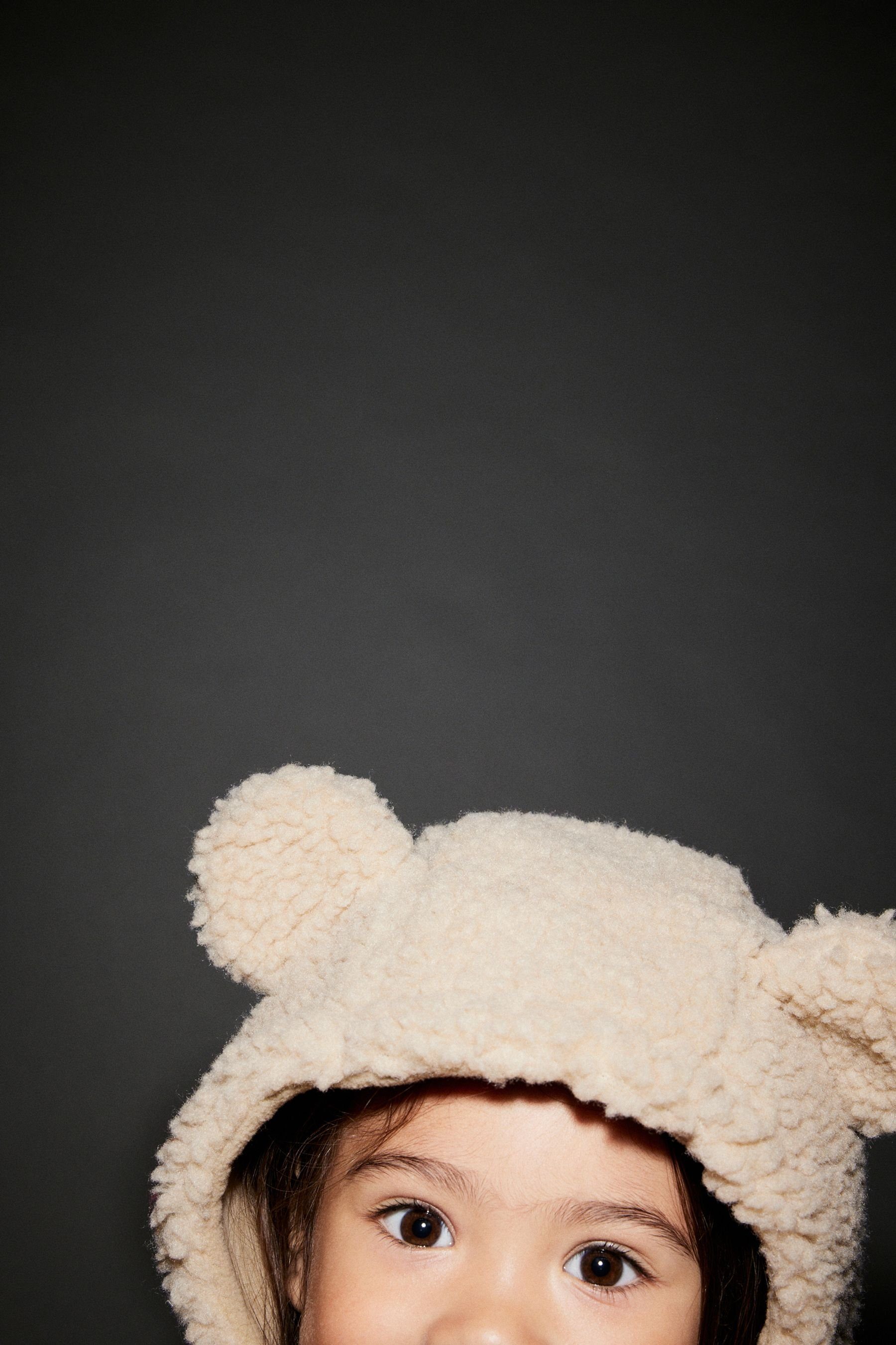 (1-St) Teddykunstfell Fleecemütze Next Kopfbedeckung aus