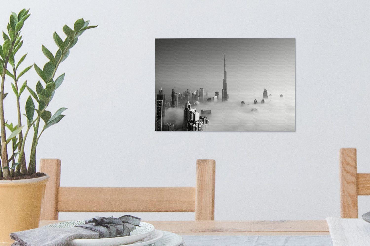 in Wandbild weiß, dem OneMillionCanvasses® Aufhängefertig, Nebliger Burj Leinwandbild (1 Leinwandbilder, Dubai St), - Morgen und unter Wanddeko, cm 30x20 schwarz Khalifa