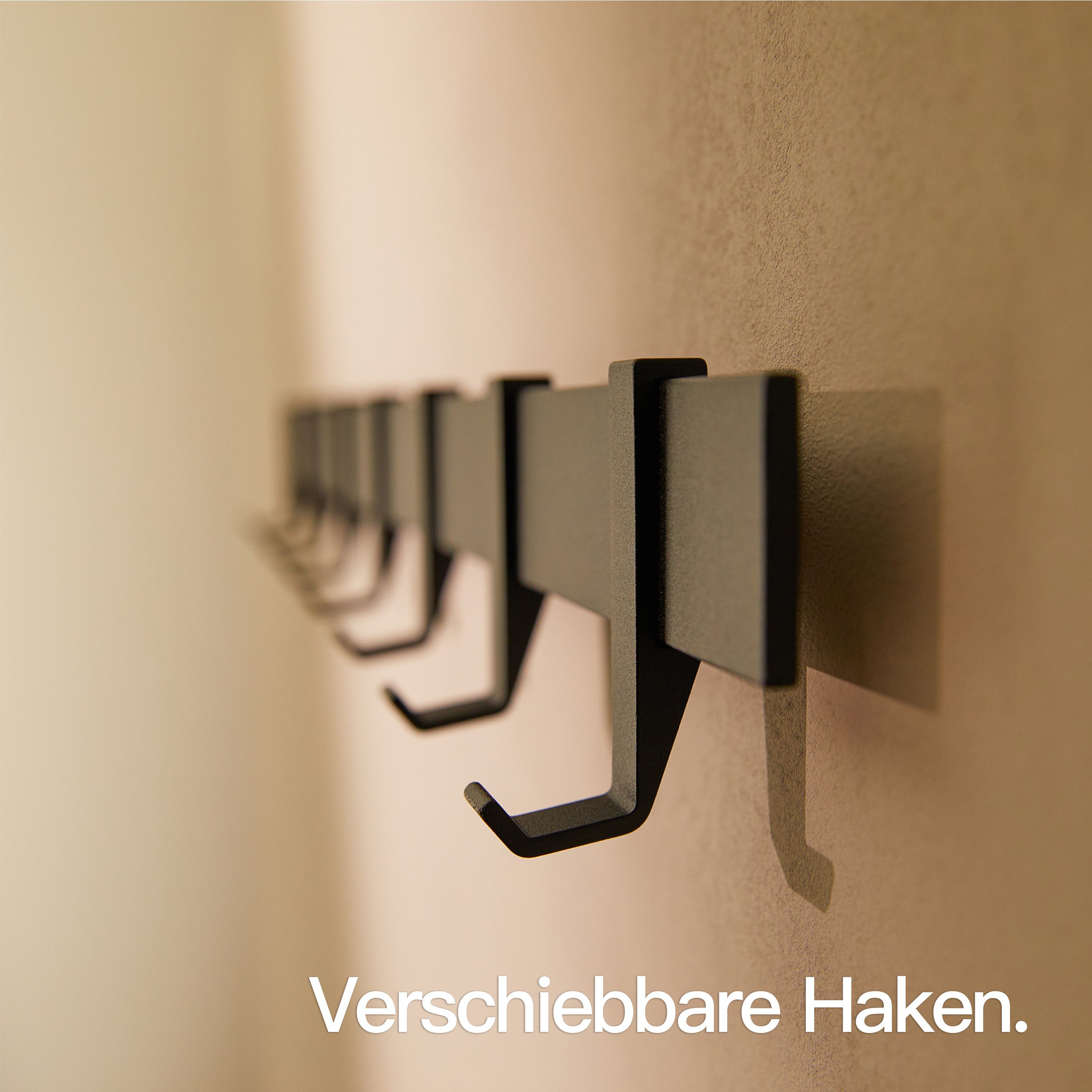 Designfabrik Hamburg Garderobenleiste, Wandgarderobe aus Metall, Garderobenhaken modern, verschiebbare Haken, schwebende Optik