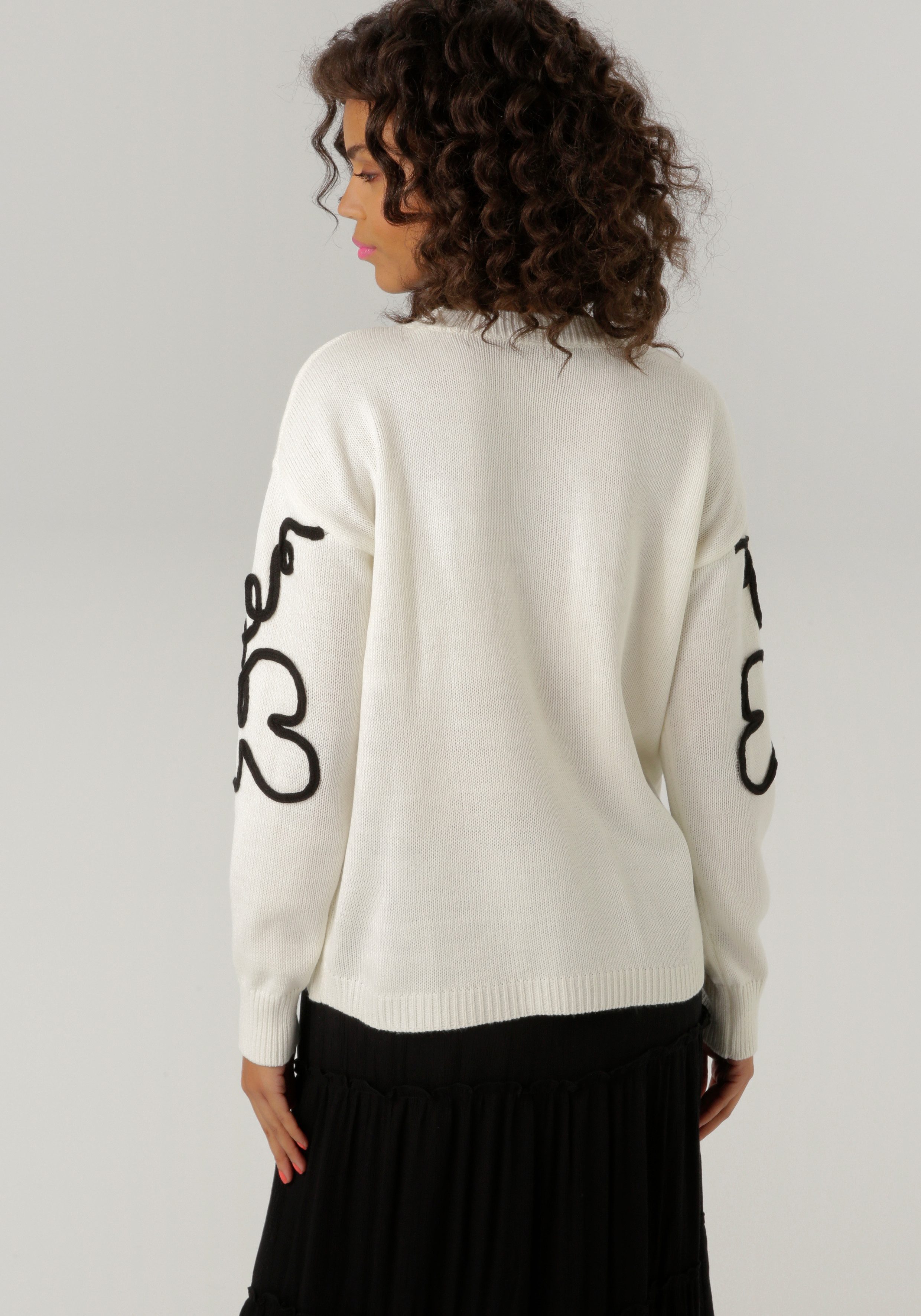 Aniston CASUAL Strickpullover, mit extravaganten Blüten-Applikationen günstig online kaufen