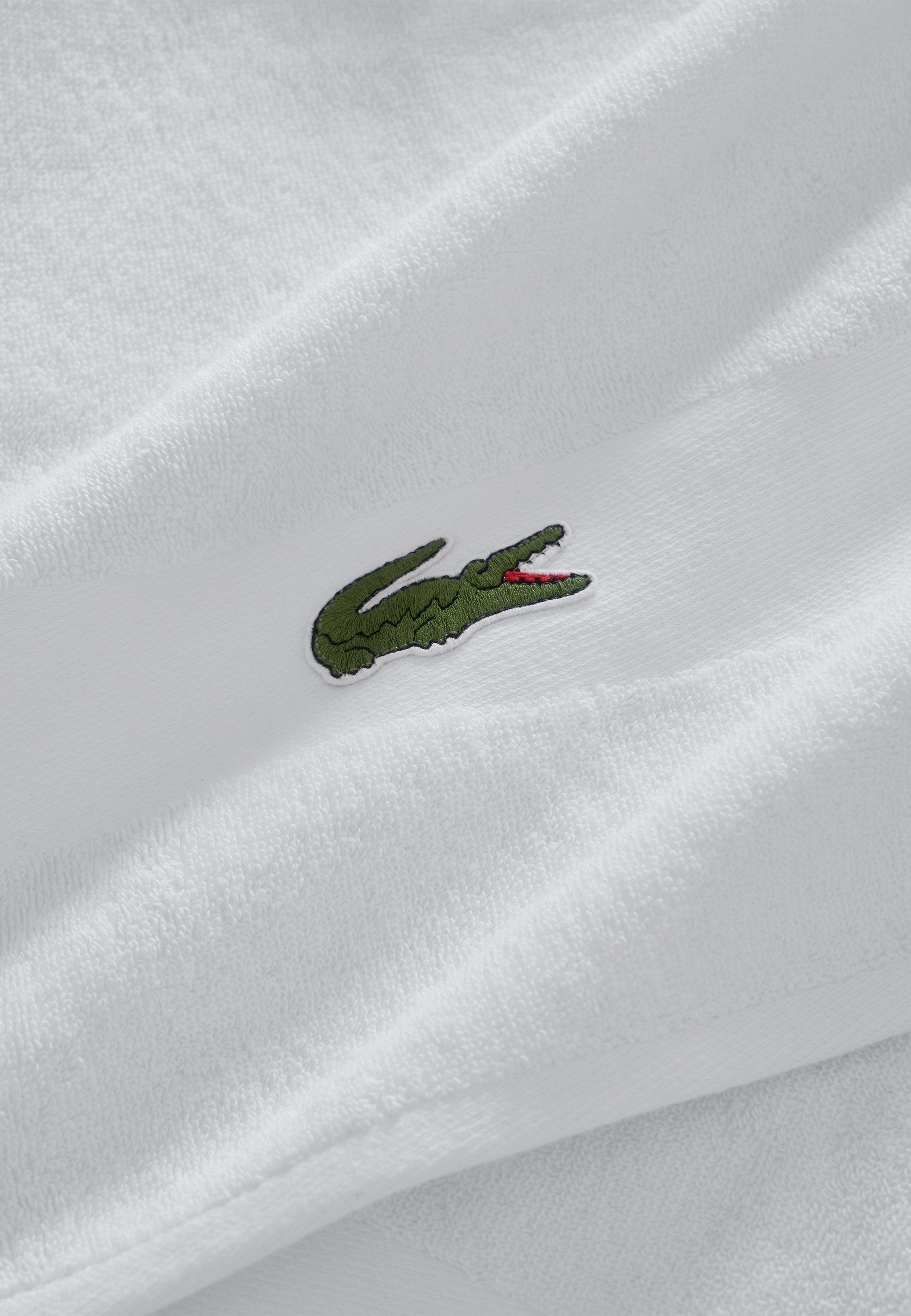Lacoste Handtuch LCASUAL, Frottier (1-St), mit Label-Applikationen und Bordüre