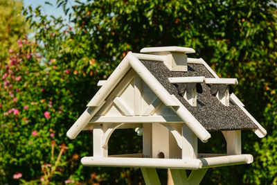 DSH DEKO SHOP HANNUSCH Vogelhaus Vogelhaus V 19 Stein in weiß oder braun, • Holz mit Steinputz • 50 x 36 cm