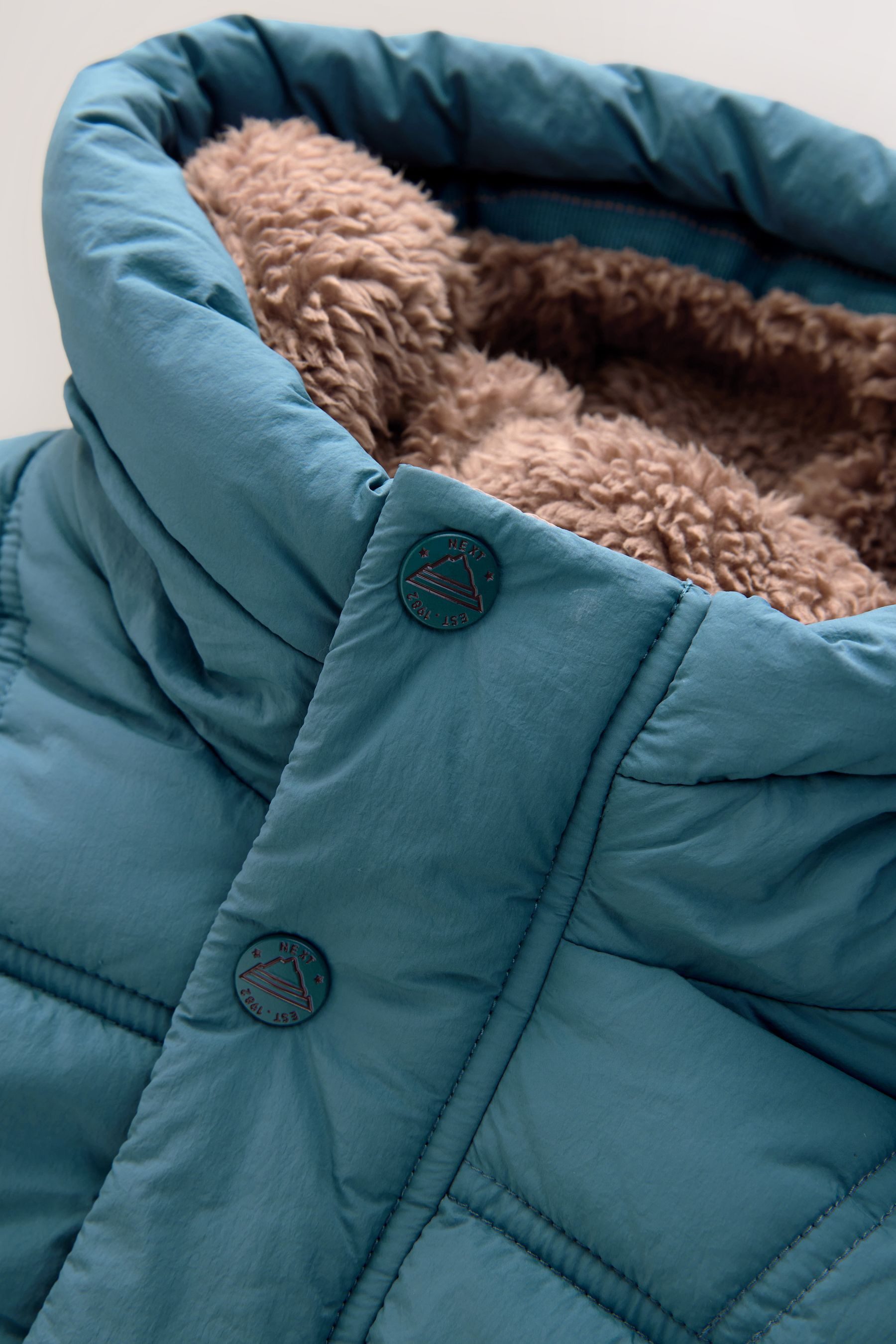 Next Steppmantel Steppmantel mit Teddykunstfellfutter (1-tlg)