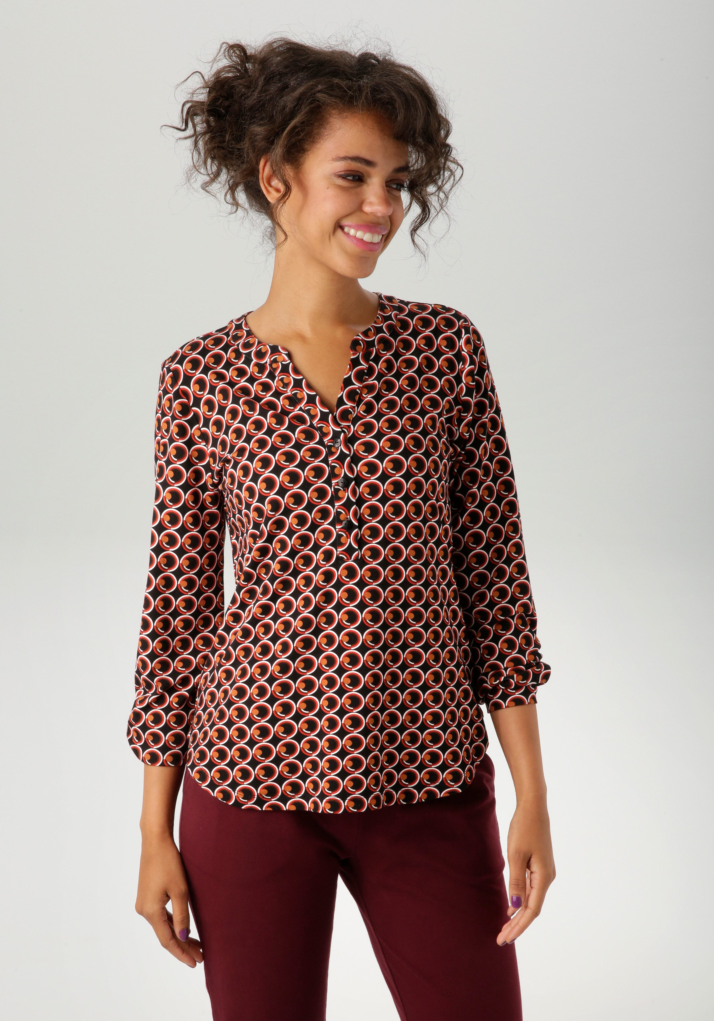 Aniston CASUAL Schlupfbluse mit ausdrucksvollem Retro-Druck günstig online kaufen