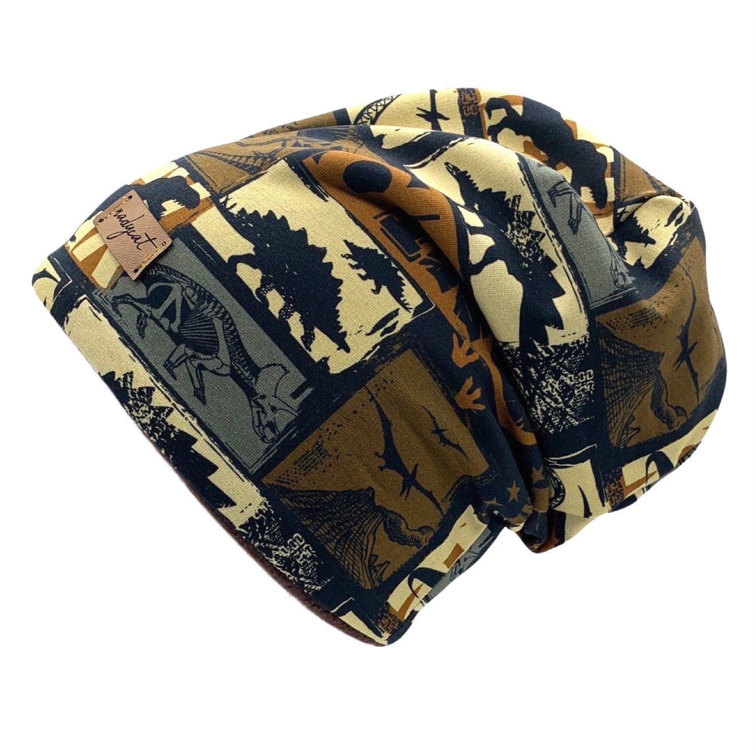 nadycat Beanie DINOSAURIER braun-schwarz (2-St., Beanie mit passendem Loop) günstig online kaufen