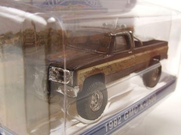 GREENLIGHT collectibles Modellauto GMC K2500 Sierra Grande Pick Up 1982 Ein Colt für alle Fälle Dirty, Maßstab 1:64