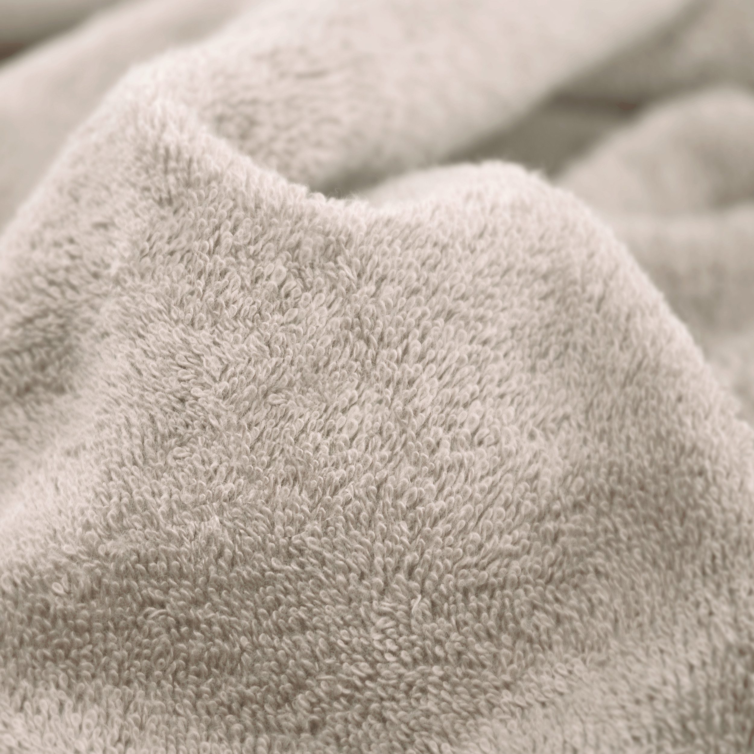 Möve Waschhandschuh Superwuschel 100% Premium Cotton Baumwolle, Walkfrottier (1-St), mit Biesenbordüre und praktischem Kordelaufhänger, einfarbig, weich