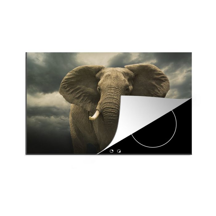 MuchoWow Herdblende-/Abdeckplatte Afrikanischer Elefant gegen die dunklen Wolken Vinyl (1 tlg) induktionskochfeld Schutz für die küche Ceranfeldabdeckung