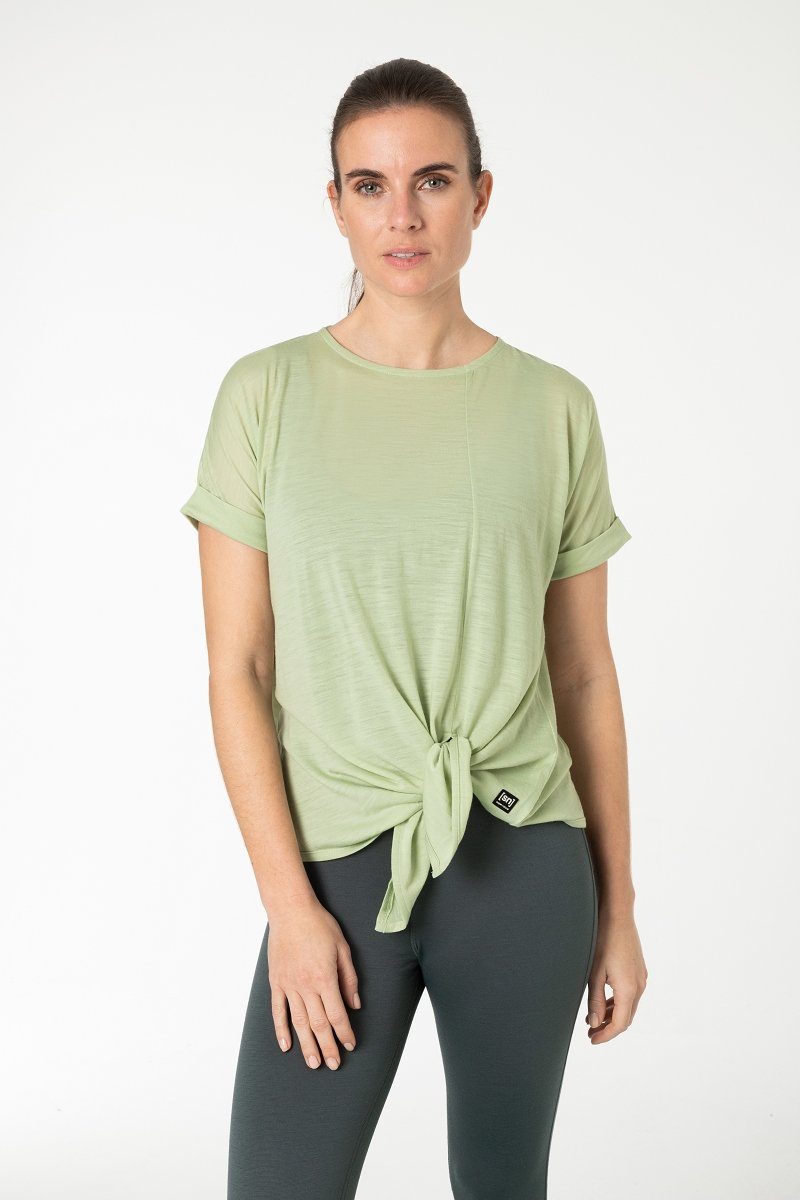 SUPER.NATURAL T-Shirt Merino T-Shirt W JP KNOT TEE mit Knoten-Detail am Saum, feinster Merino-Materialmix Celadan Green