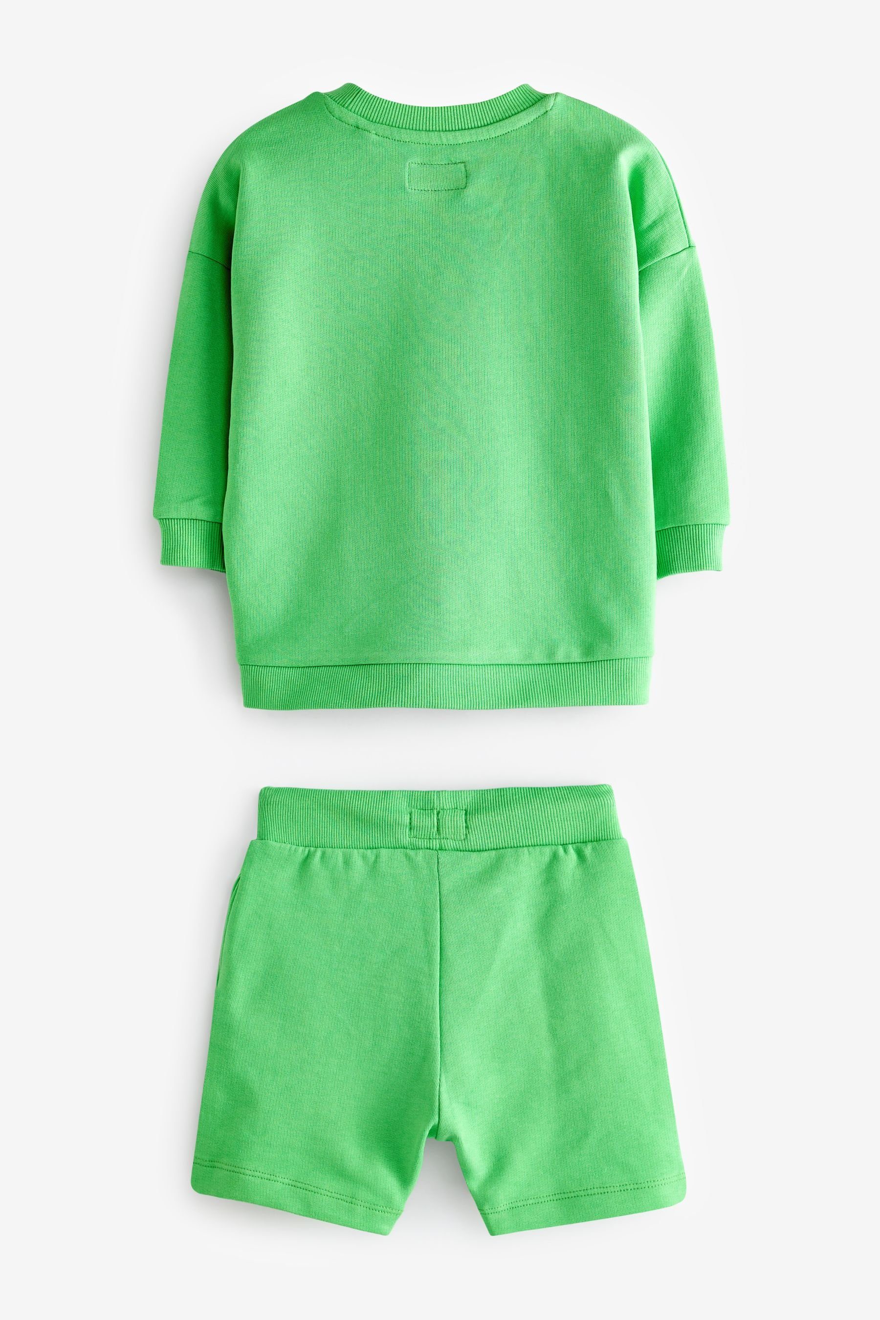 Shorts (2-tlg) Green mit Bright Set im Dino Figur Rundhalssweatshirt und Sweatanzug Next