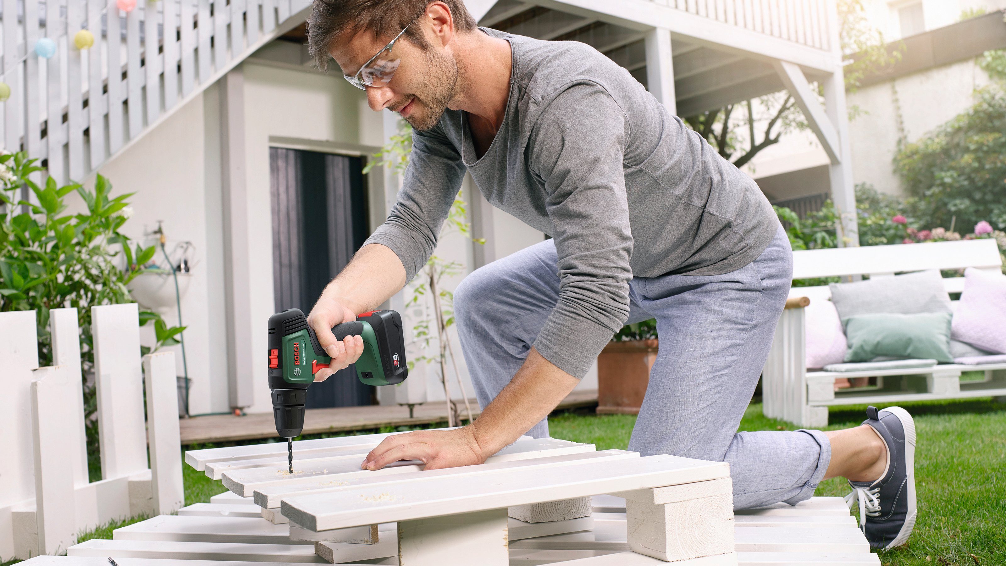 Bosch Home & Garden Akku-Schrauber Universaldrill 18V, 1450 U/min, 40 Nm, mit Akku und Ladegerät