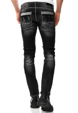 Rusty Neal Straight-Jeans URUMA mit trendigen Zierelementen