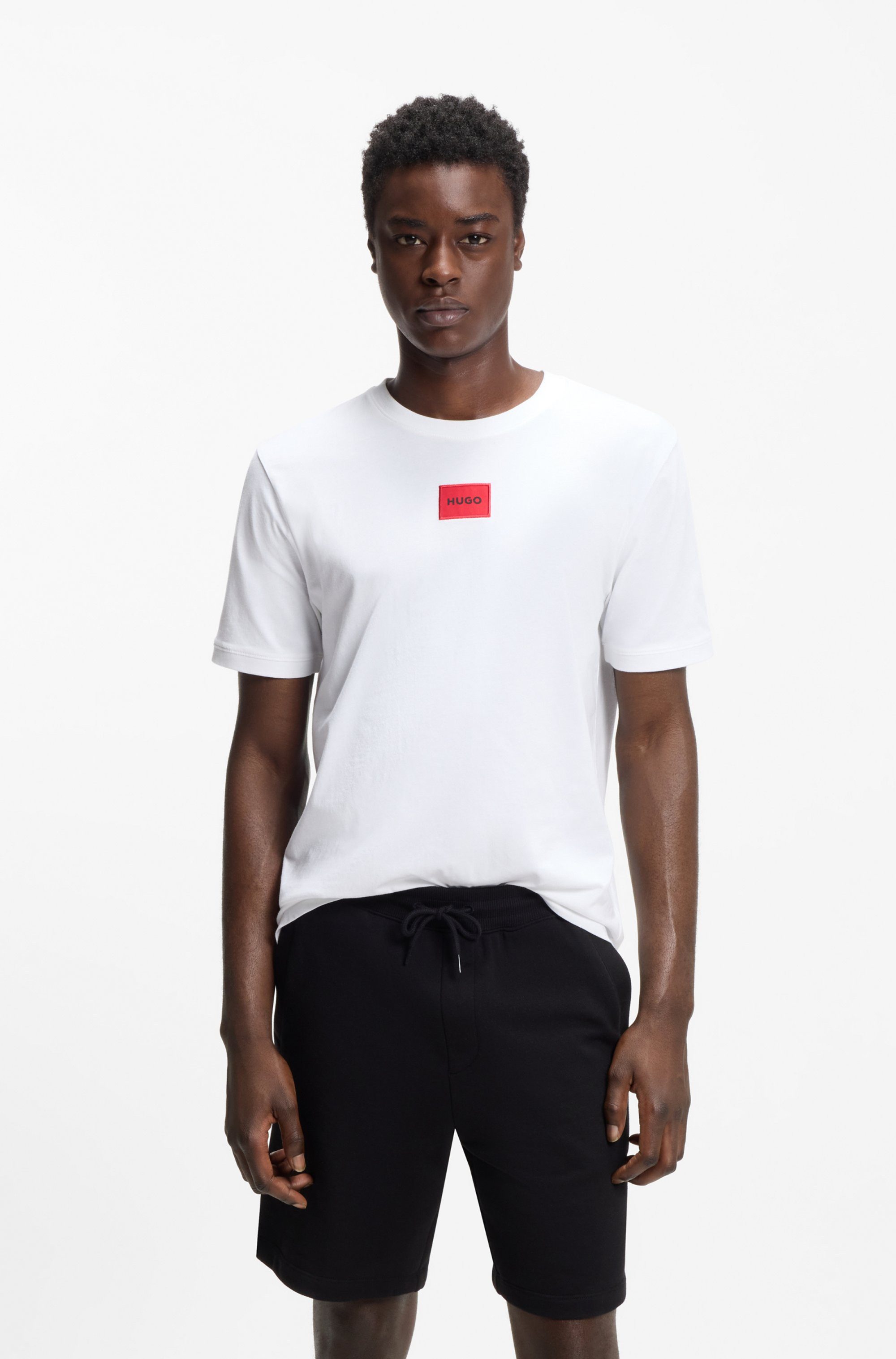 HUGO T-Shirt Diragolino Rundhalsausschnitt, Regular Fit, Logo-Label günstig online kaufen