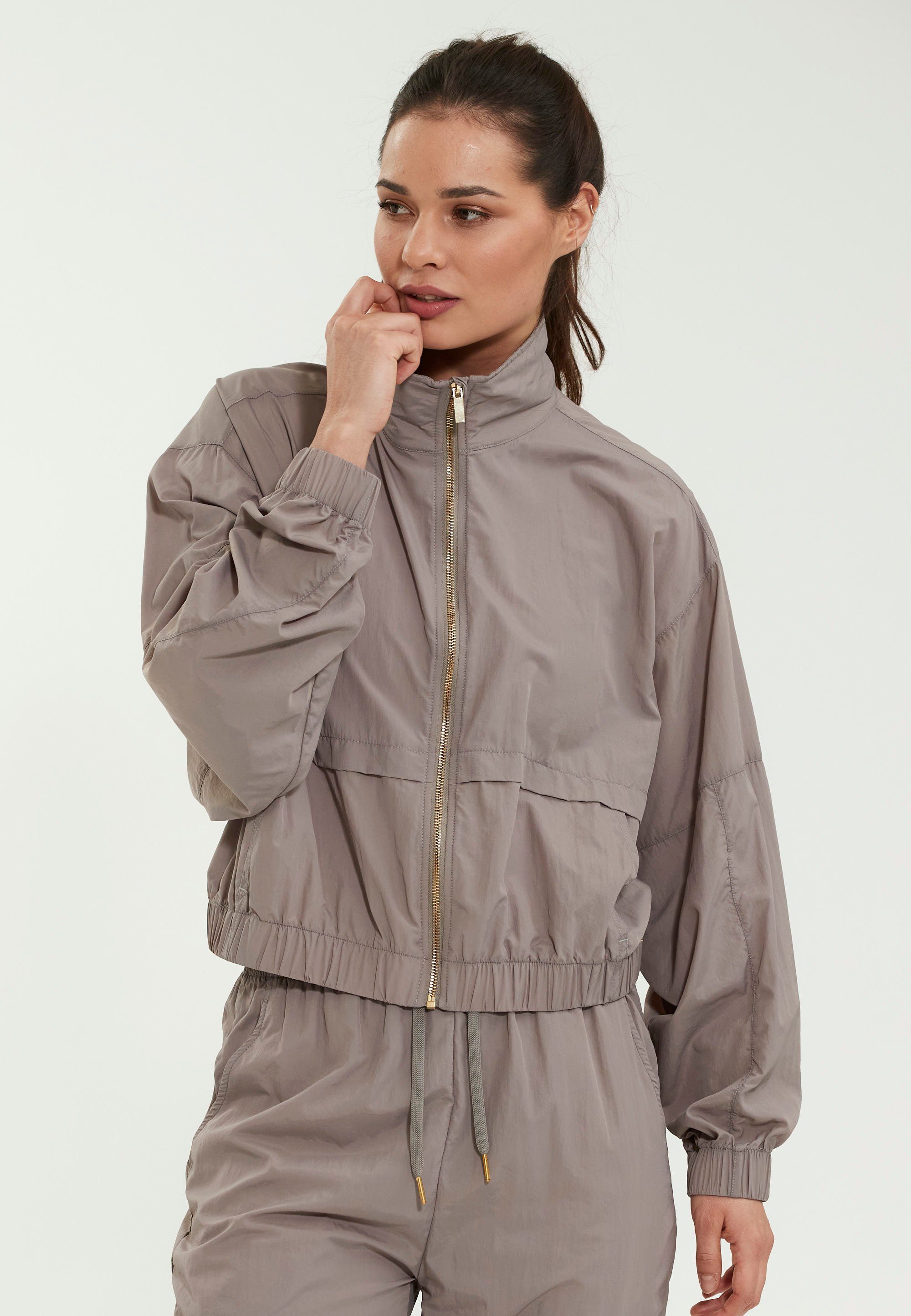 ATHLECIA Trainingsjacke Tharbia in zweifarbigem Design